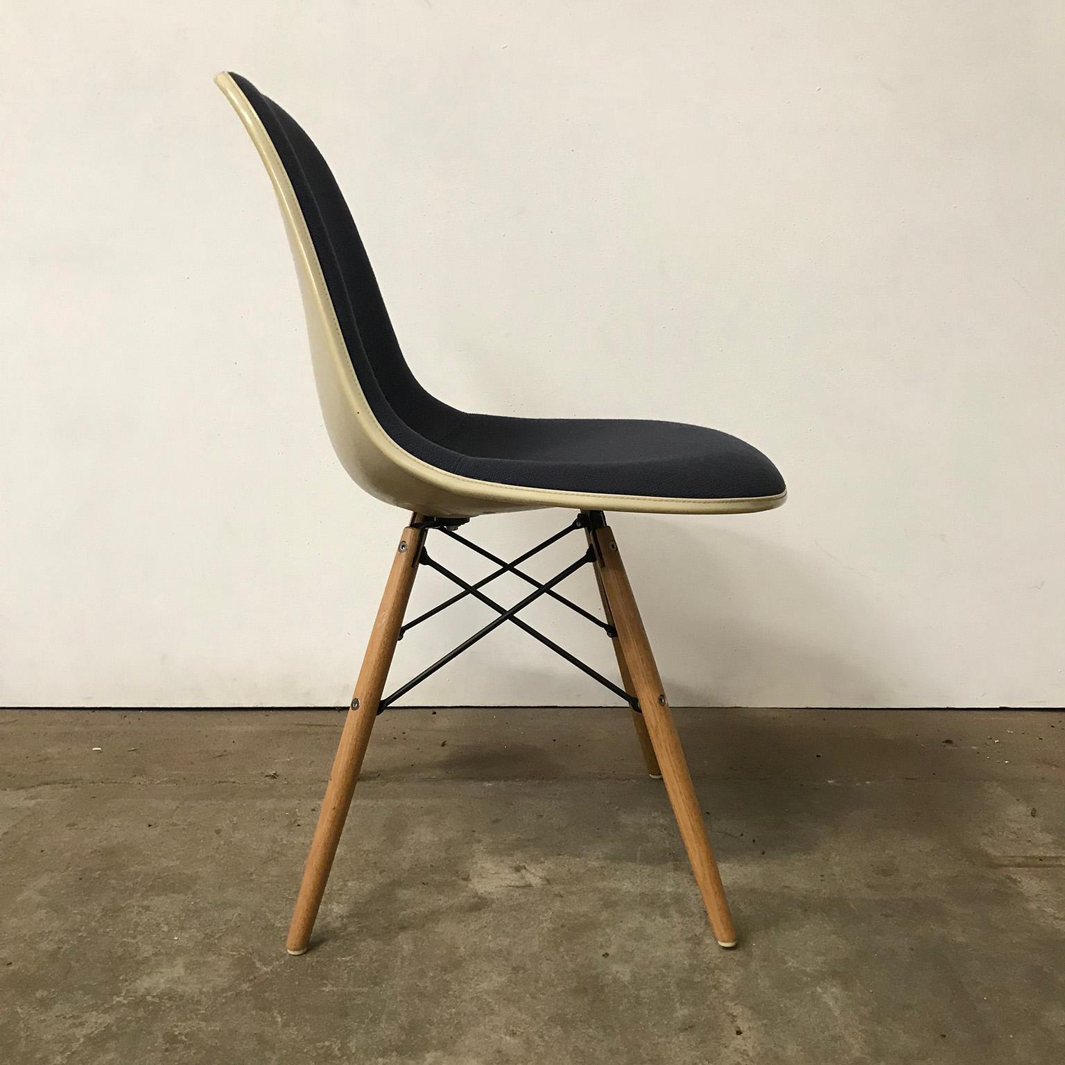 Shell with Lavander purple upholstery with beech wooden dowel base with black wire. The shell is by Herman Miller, Vitra (picture #16). The upholstery is good except for two darker spots (#14 and #15). The wooden legs show traces of wear like some
