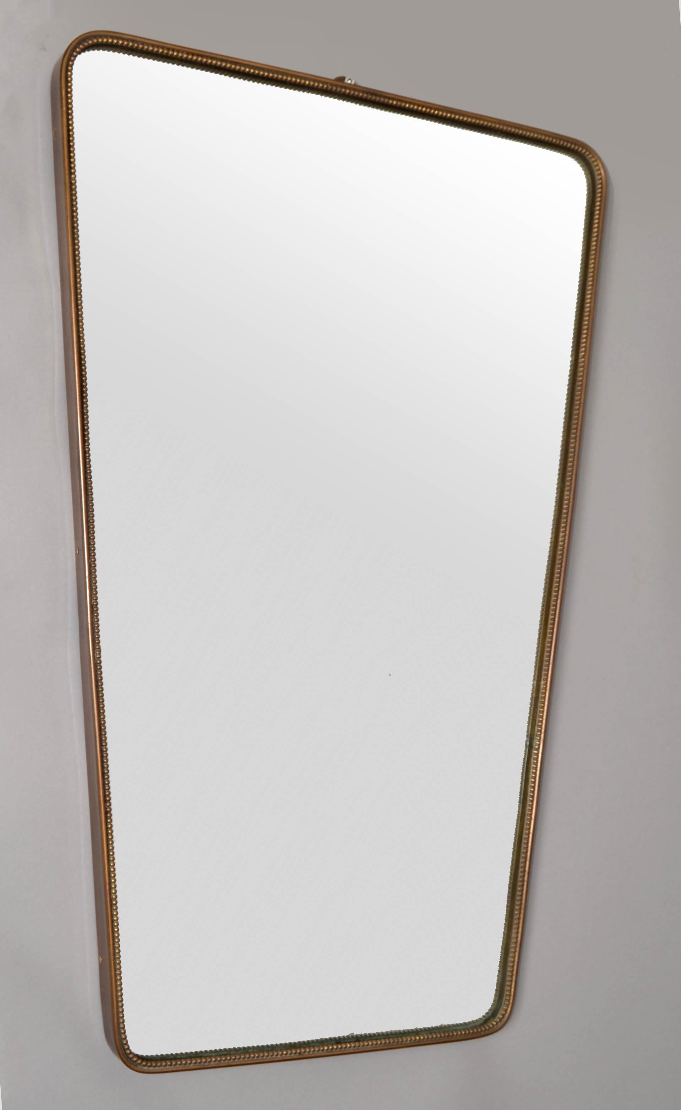 Art Deco 1950s whimsical dotted Brass Decoration Mirror with round edges in the Style of Gio Ponti and attributed to Paolo Buffa.
All Original handcrafted Brass Frame with hardwood backing for secure hanging.
In good condition with some specks and