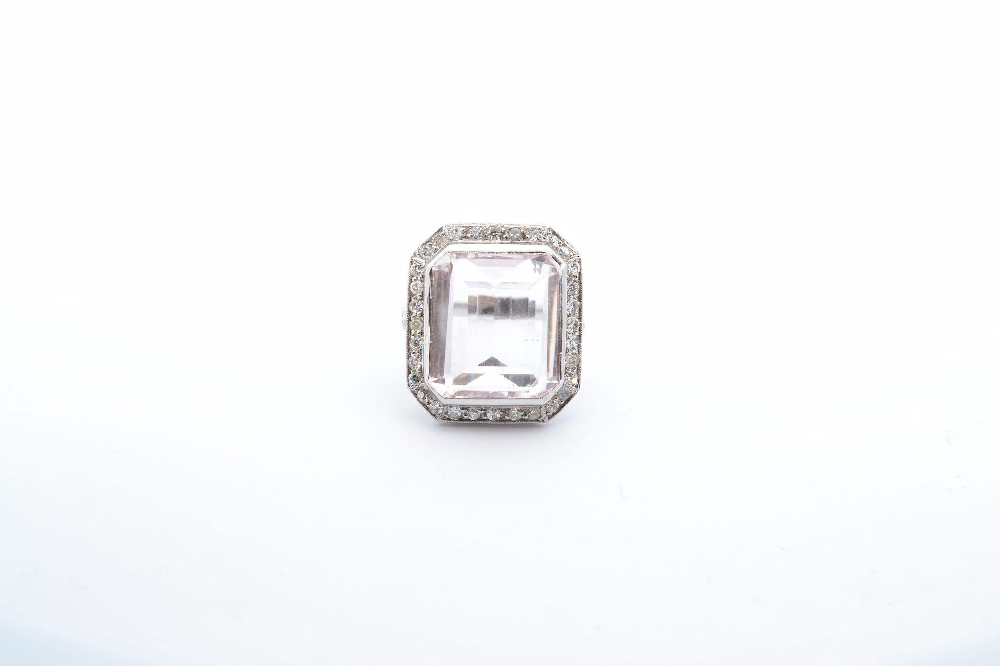 Stones: Natural morganite of 14.5 cts and 32 diamonds, weight: 0.75ct
Material: Platinum
Dimensions: 21mm x 19mm
Weight: 10.2g
Period: 1950
Size: 55 (free sizing)
Certificate
Ref. : 25085