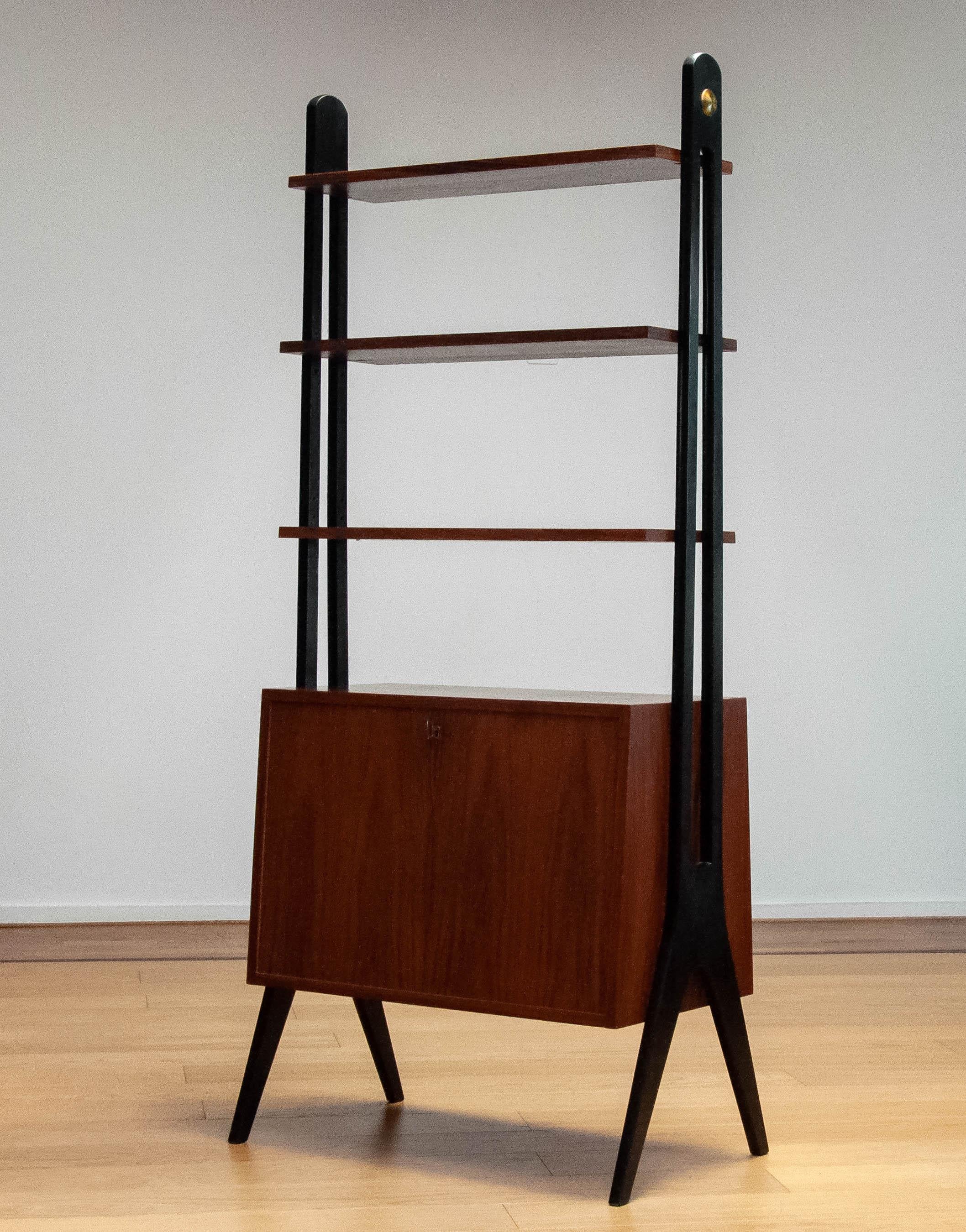 Scandinavian Modern 1950 Rosewood Bookcase Room Divider With Black Lacquered Stands By Treman Sweden