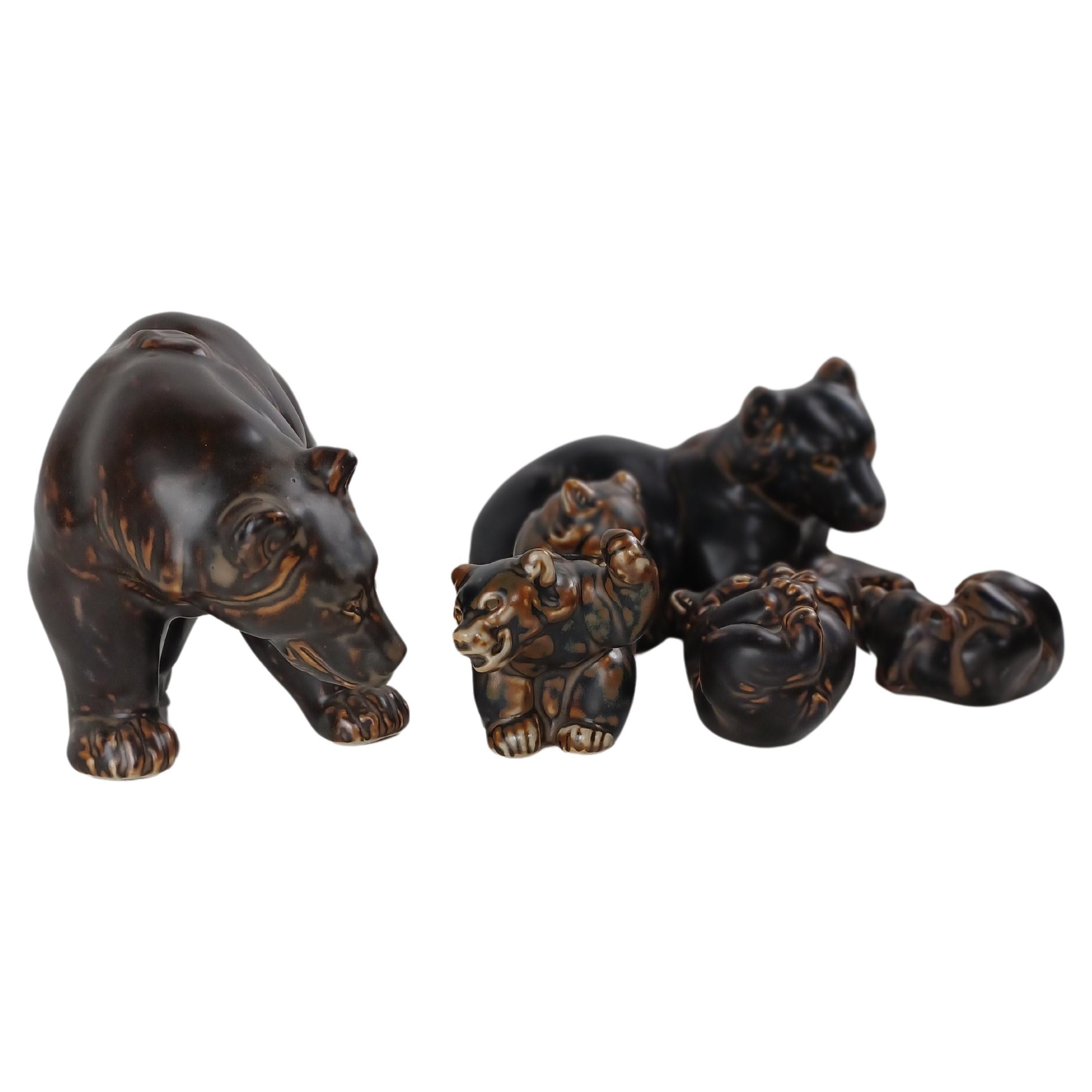 Danish Knud Kyhn bear family figurines for Royal Copenhagen

The lively bears were created by Knud Kyhn (1880-1969) in 1957. Knud Kyhn worked for for Royal Copenhagen from 1903-1910, 1924-1932 and 1936-1967. During this period he created many