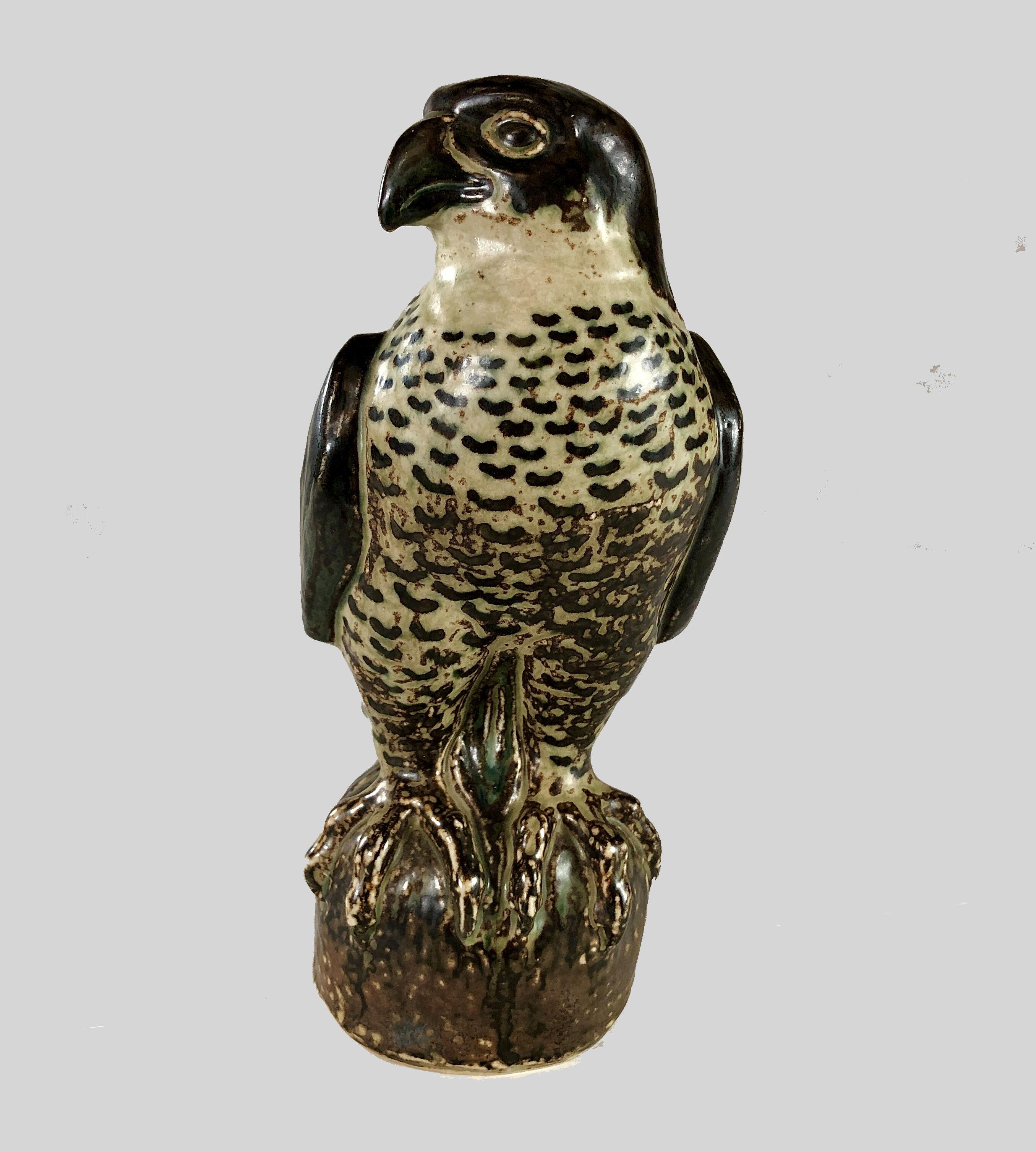 Danish Knud Kyhn falcon figurine for Royal Copenhagen

The lively falcon was created by Knud Kyhn (1880-1969) in 1957. Knud Kyhn worked for Royal Copenhagen from 1903-1910, 1924-1932 and 1936-1967. During this period he created many figures of