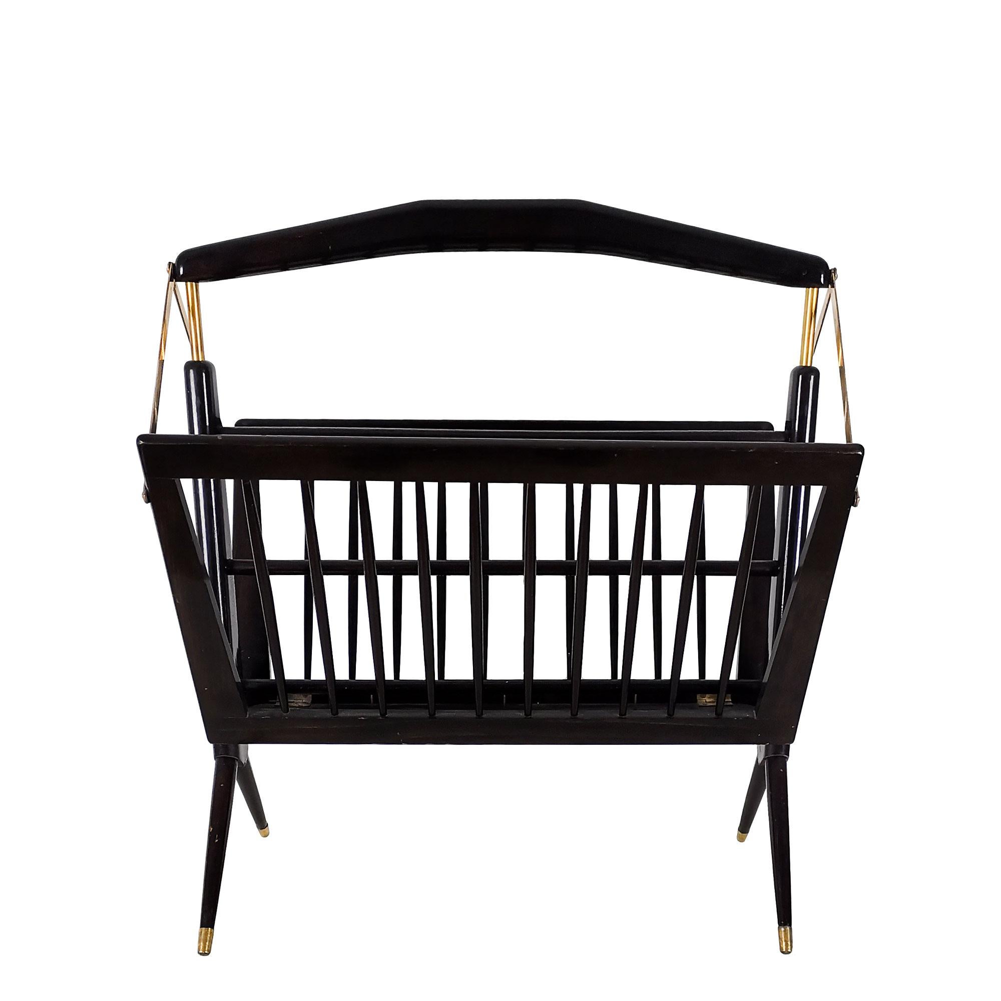 Folding magazine rack, dark stained and varnished wood.
Design: Cesare Lacca

Italy c. 1950.