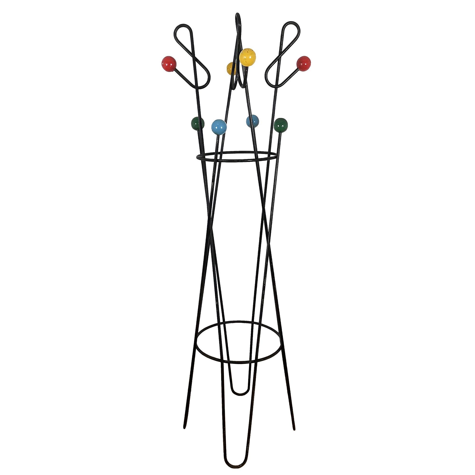 Large coat rack in blackened solid steel tubes and painted wood balls in four colours. Original condition.
Design: Roger Ferraud

France c. 1950.