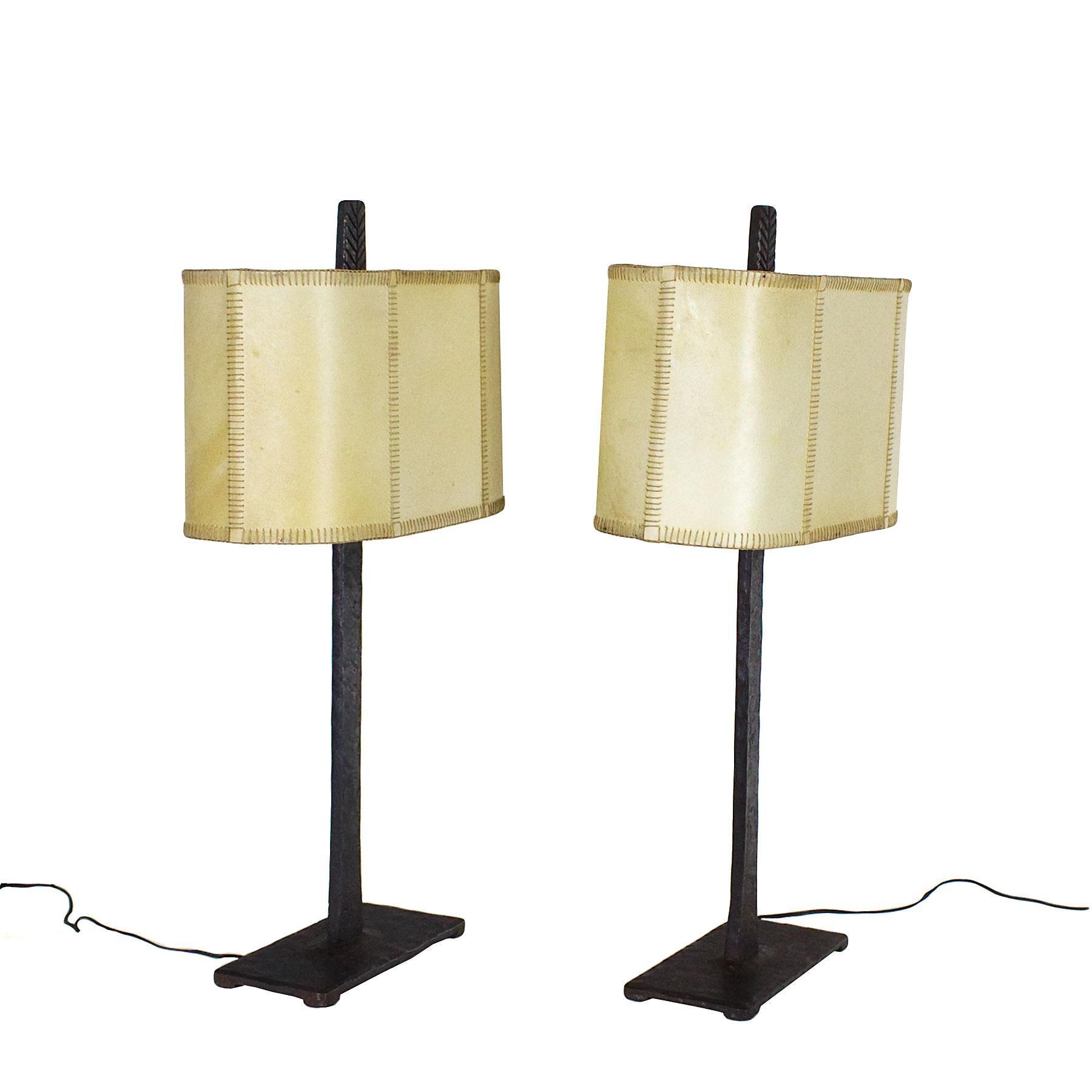 Splendid pair of table lamps, wrought iron and original parchment lampshades.

Spain, Barcelona, circa 1950.