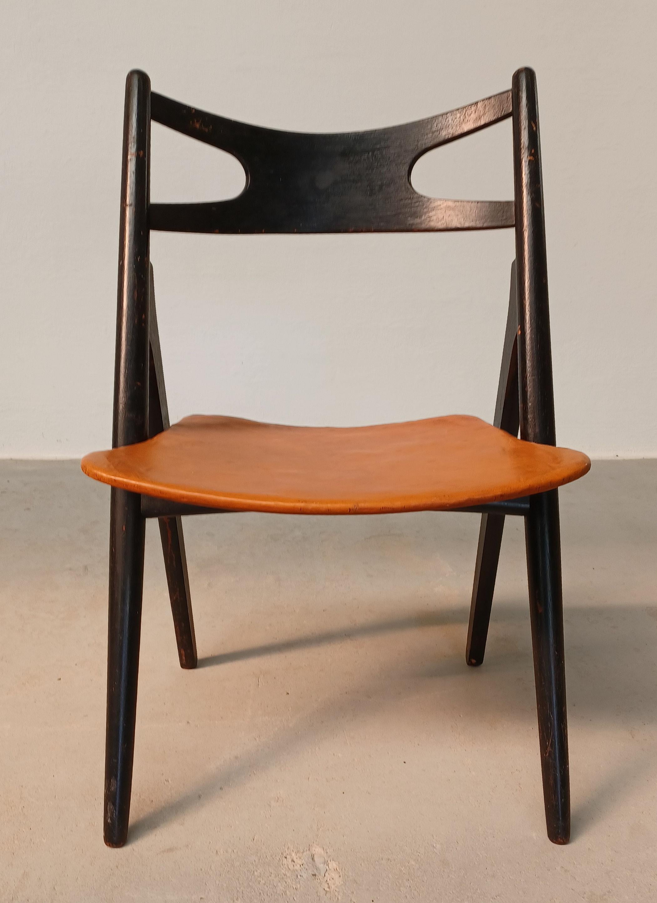 Danish 1950´s Patinated Hans Wegner Sawbuck Chair with Original Leather For Sale