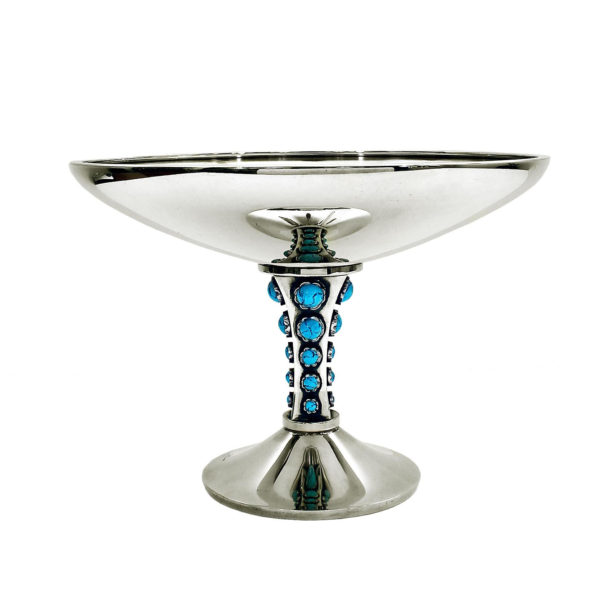 Sterling silver cup, turquoise enamels encrustation. 
Stamps: Bagués, others illegibles. 
Weight: 878 grms
Barcelona, circa 1950.