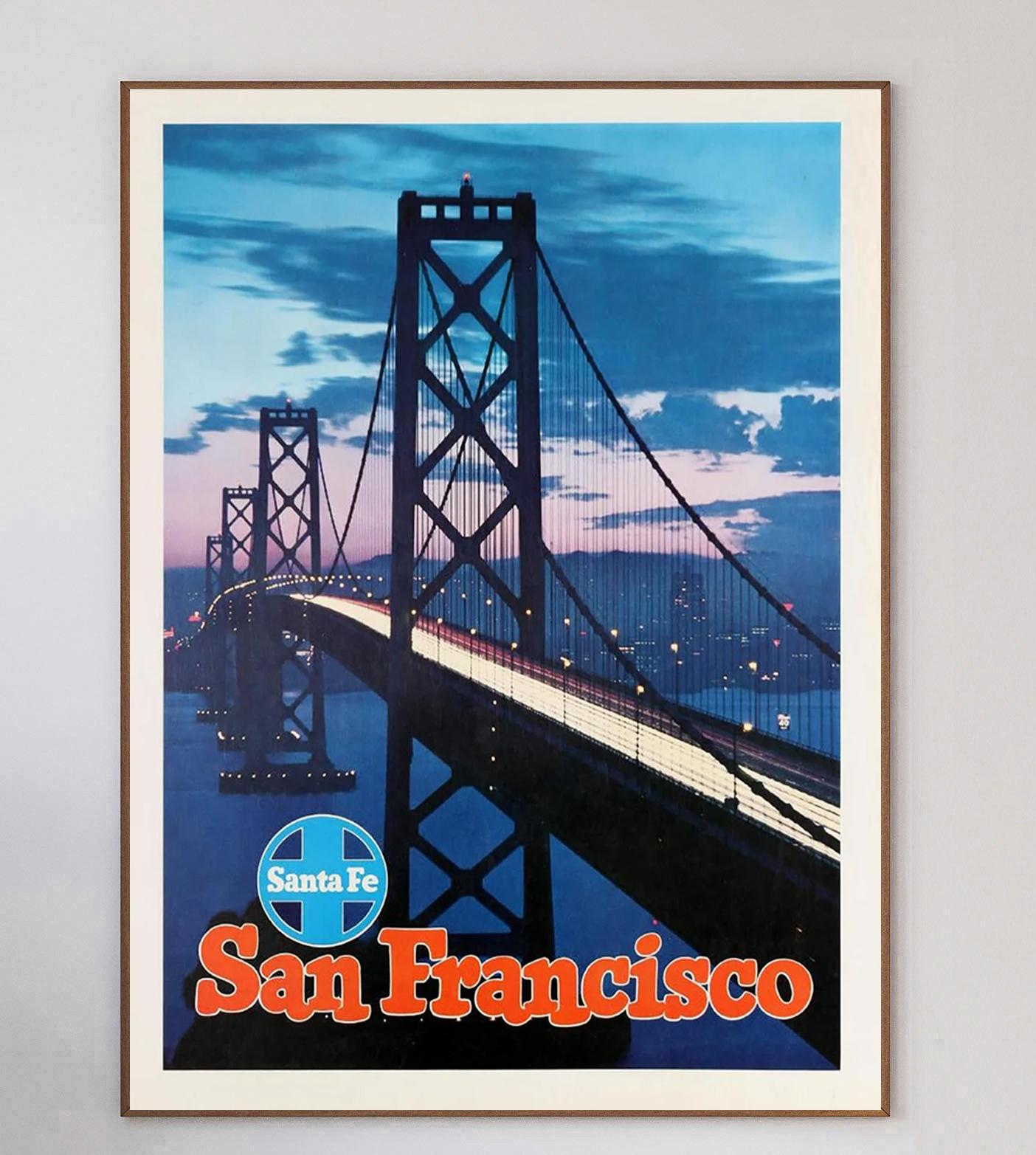 Stunning poster for the Santa Fe Railway promoting routes to San Francisco, California. Founded in 1859, the Santa Fe Railway, full name Atchison, Topeka and Santa Fe Railway operated for almost 140 years serving the Mid-West United States.

With