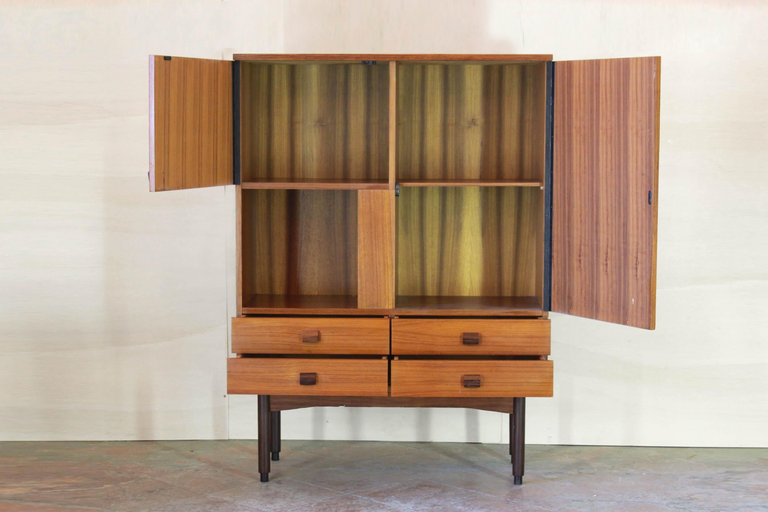 Vintage Teak high sideboard, Scandinavia 1950s
A beautiful 1950s teak vintage highboard in wood venereed with pure teak. The item has been completely restored, cleaned and polished. In excellent conditions with only few signs of time.
 