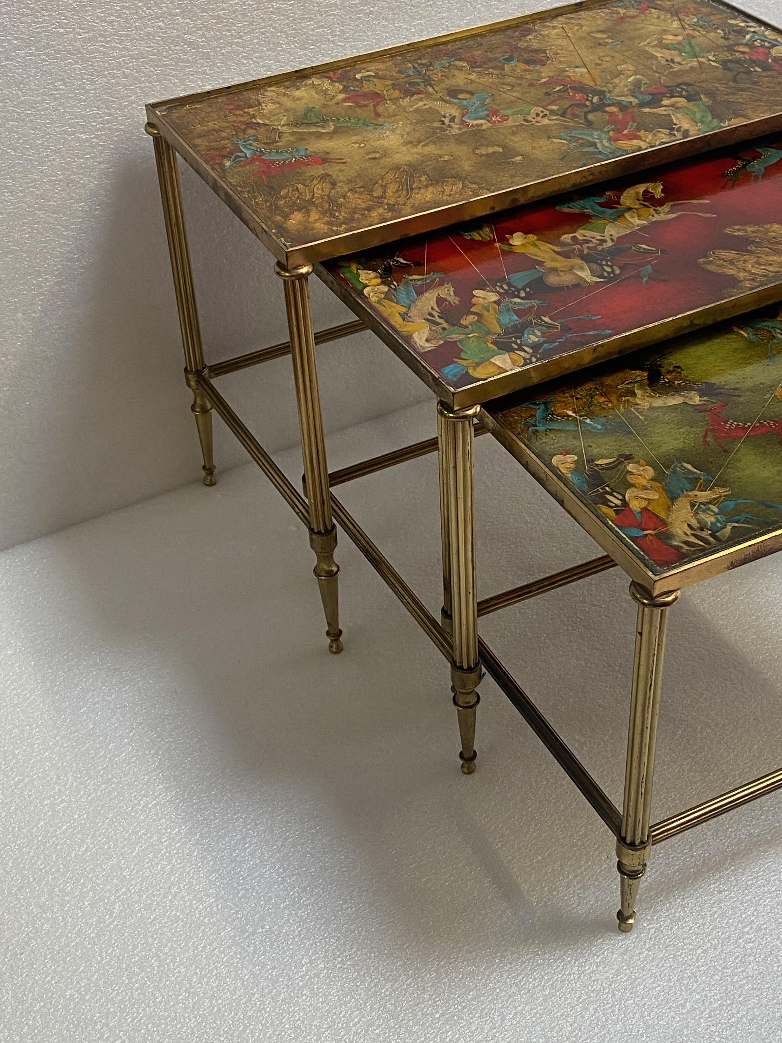 Patinated 1950′ Series of 3 Nesting Tables with Mongol Warrior Paintings Maison Baguès For Sale