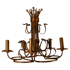 1950, travail italien, lustre en fer forgé doré et laqué noir.