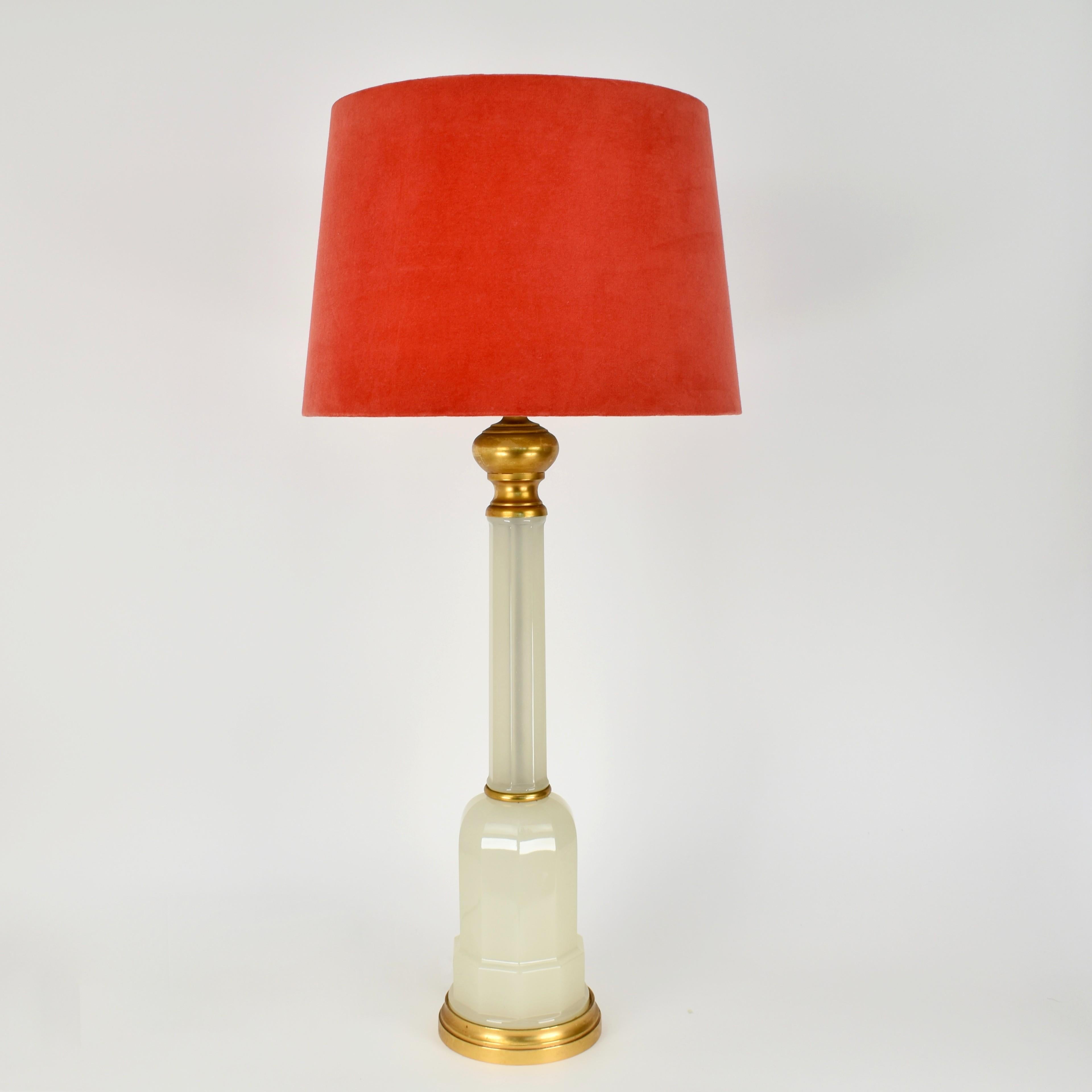 For nearly 80 years, the Murano Cenedese glass factory has been renowned for its exquisite handcrafted glass creations. Founded in Venice, Italy in 1946 by master glassblower Gino Cenedese (1907-1973). 

This opaline glass table light was made in
