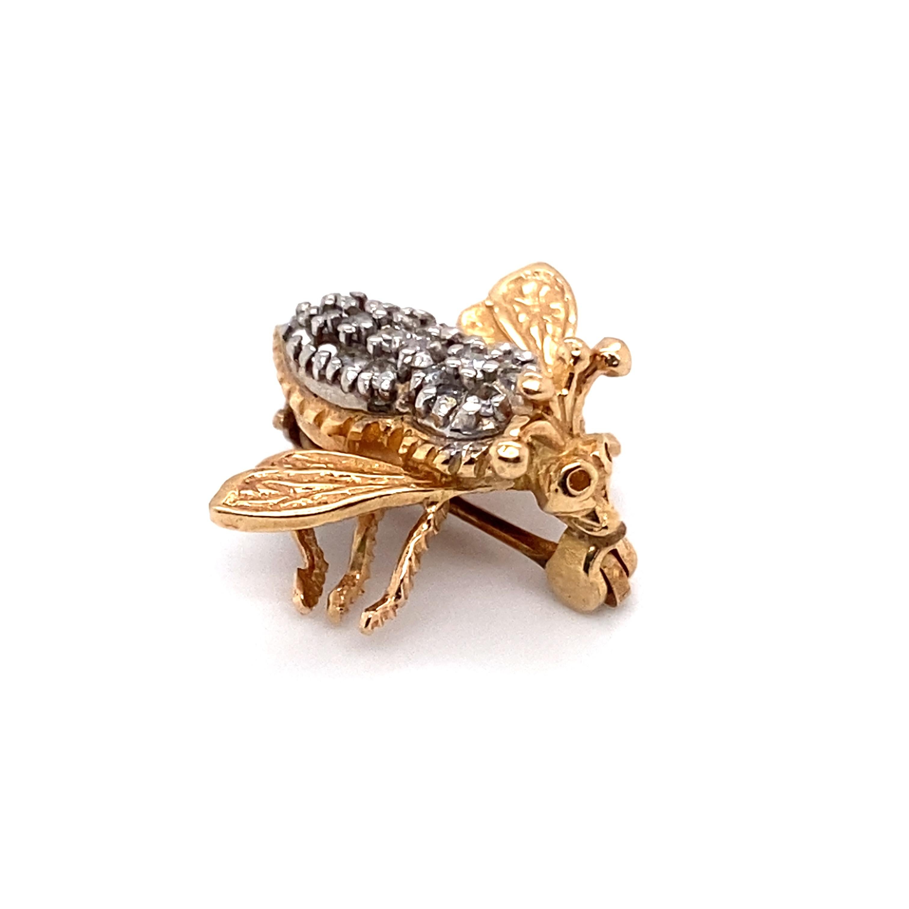 Item Details:
Metal Type: 14 Karat Two Tone Gold
Weight: 3.1 grams
.75 inches height x .75 inches width

Diamond Details:
Cut: Round
Carat: 0.20 carat total weight
Color: G
Clarity: VS

Item Features: 
It features a very life like bee made of 18