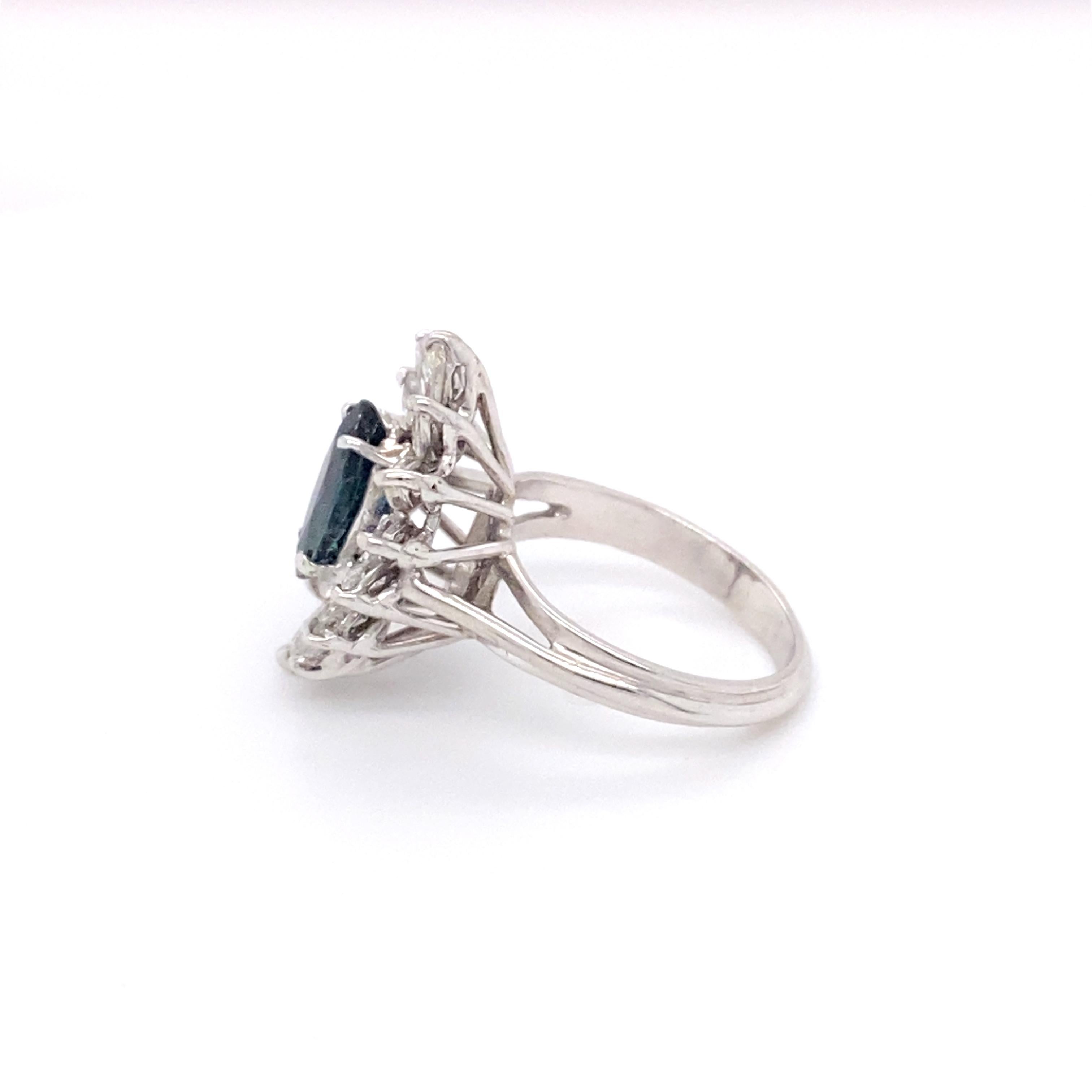 Marquise Cut 1950s 0.80 Carat Marquise Sapphire and 0.50 Carat Diamond Ring in 18K White Gold