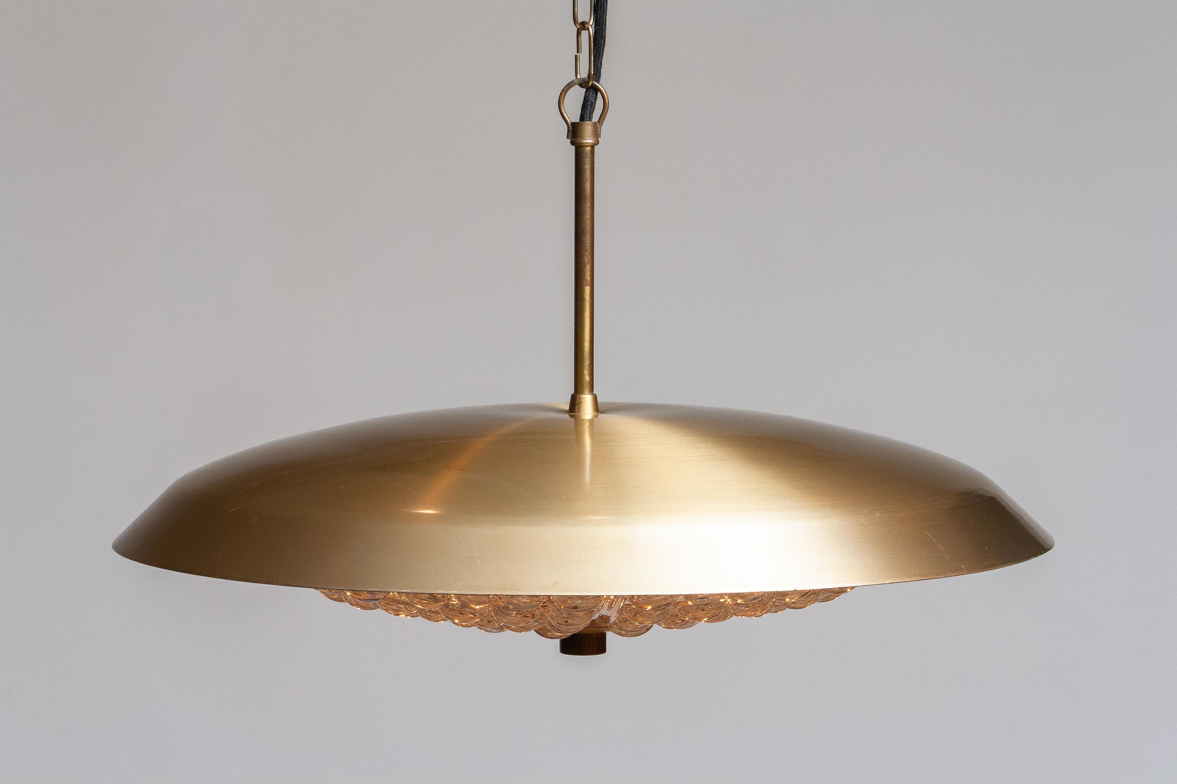 1950s, 1 Brass and Glass Ceiling Lamp Designed by Carl Fagerlund for Orrefors In Good Condition In Silvolde, Gelderland