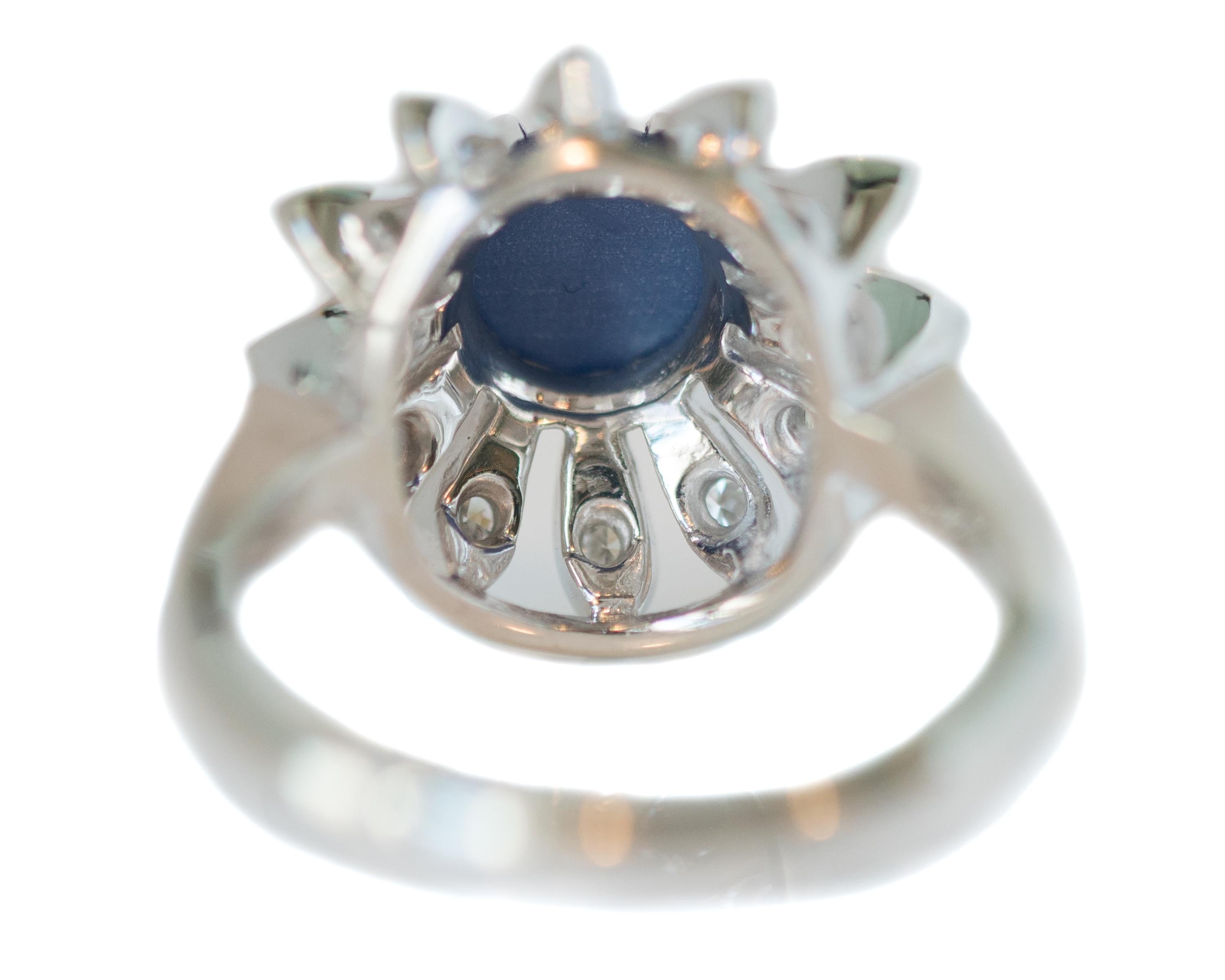 Retro 1950s 1 Carat Blue Star Sapphire, Diamond and 14 Karat White Gold Floral Ring For Sale