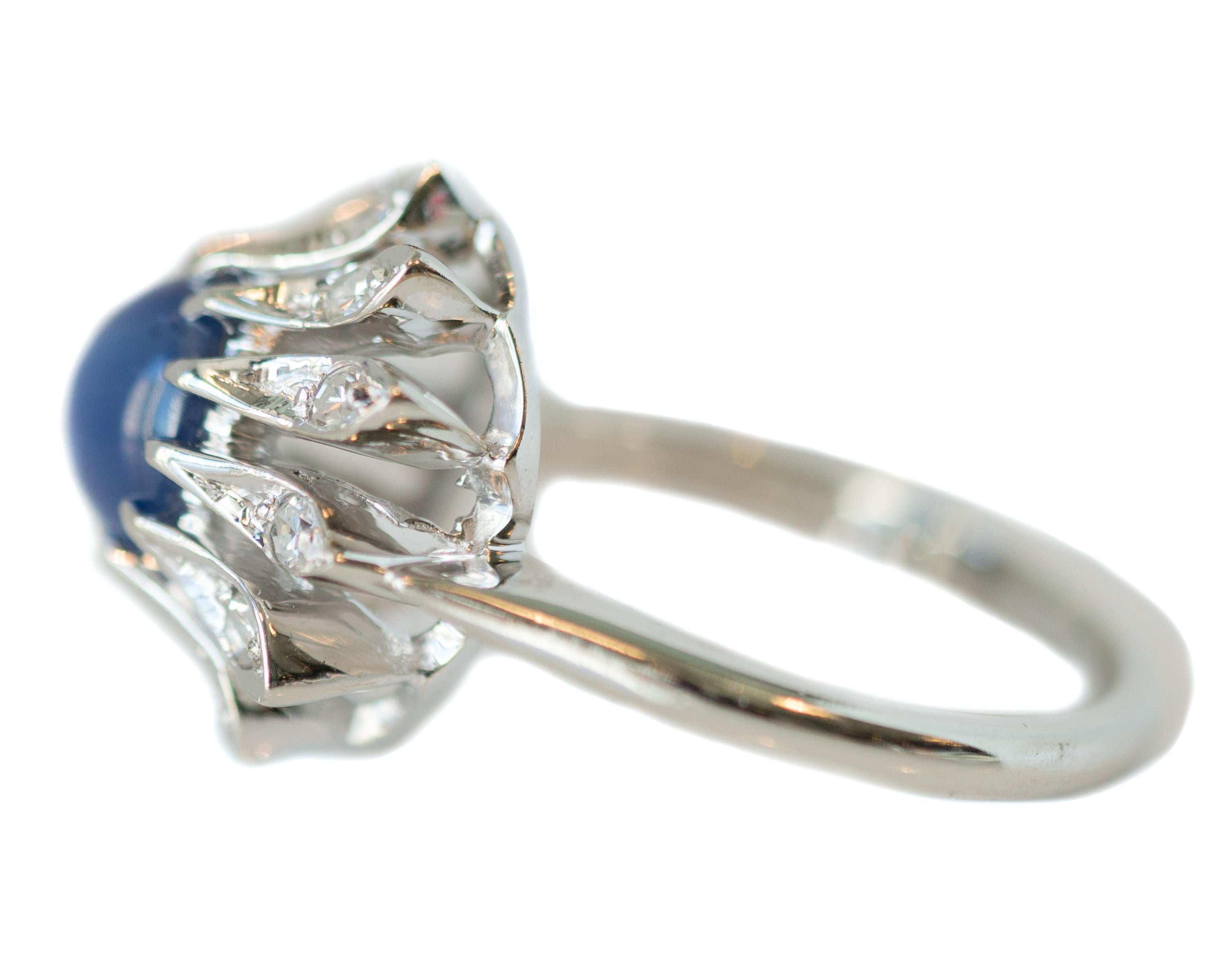 Round Cut 1950s 1 Carat Blue Star Sapphire, Diamond and 14 Karat White Gold Floral Ring For Sale