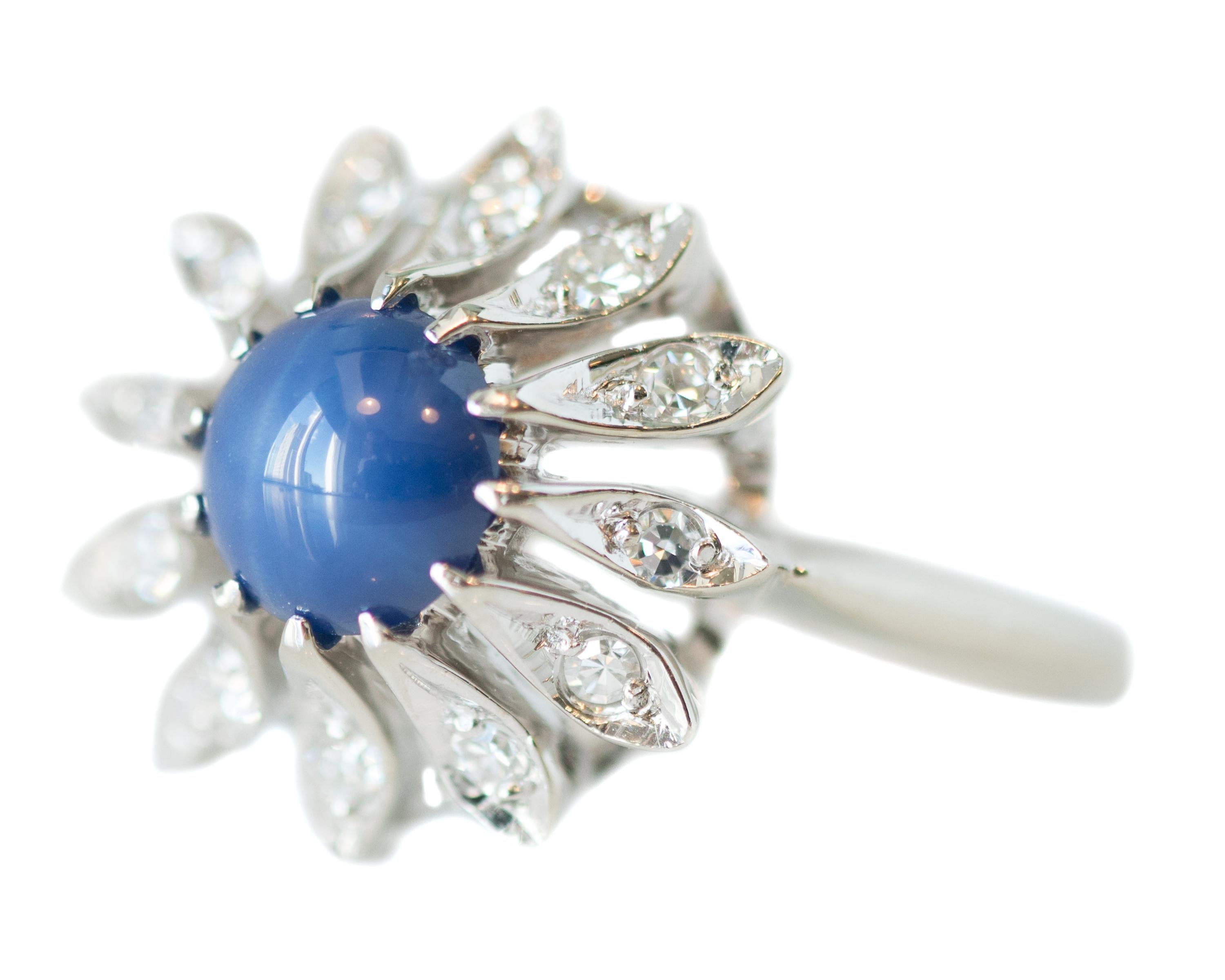 1950s 1 Carat Blue Star Sapphire, Diamond and 14 Karat White Gold Floral Ring In Good Condition For Sale In Atlanta, GA