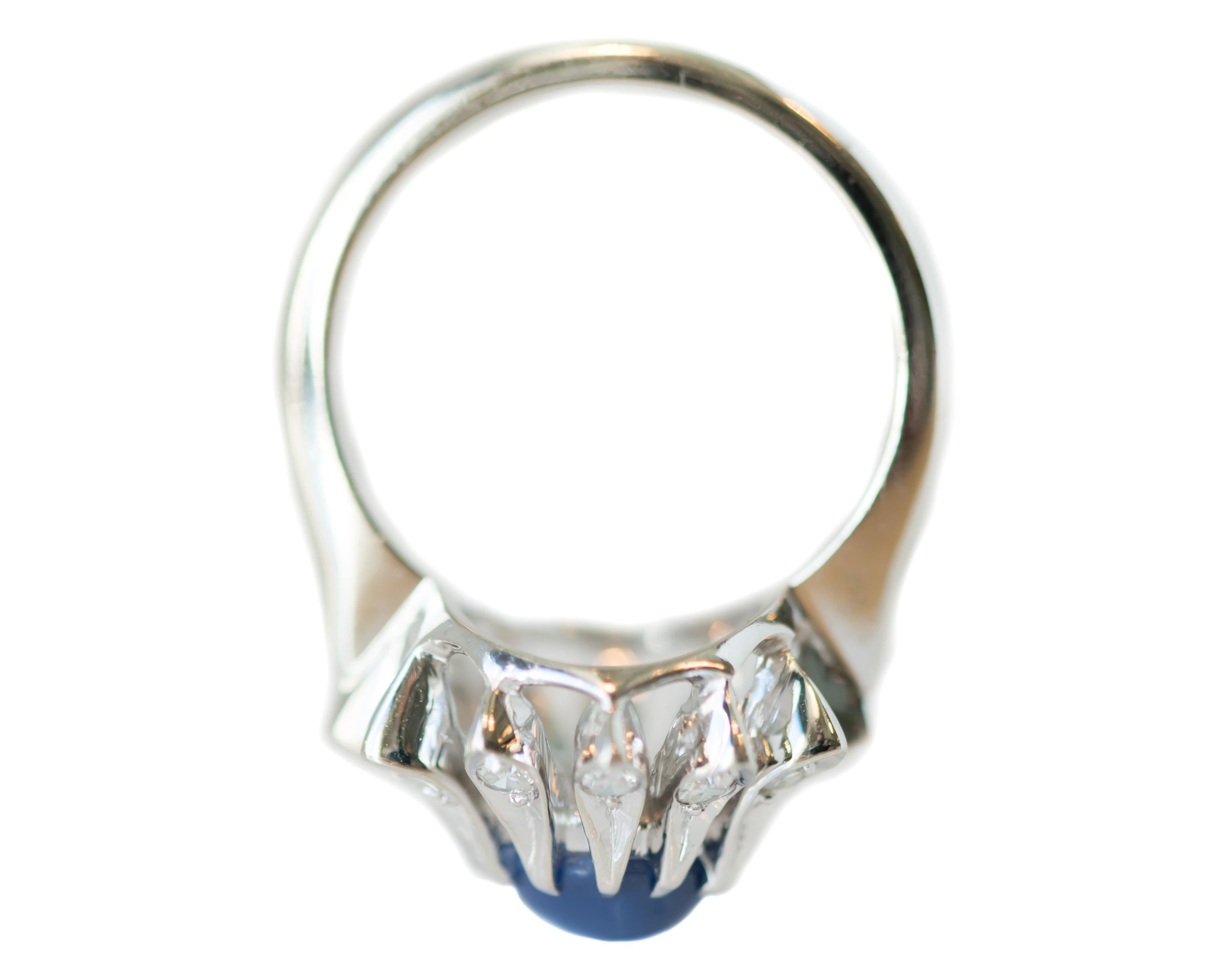 Women's 1950s 1 Carat Blue Star Sapphire, Diamond and 14 Karat White Gold Floral Ring For Sale