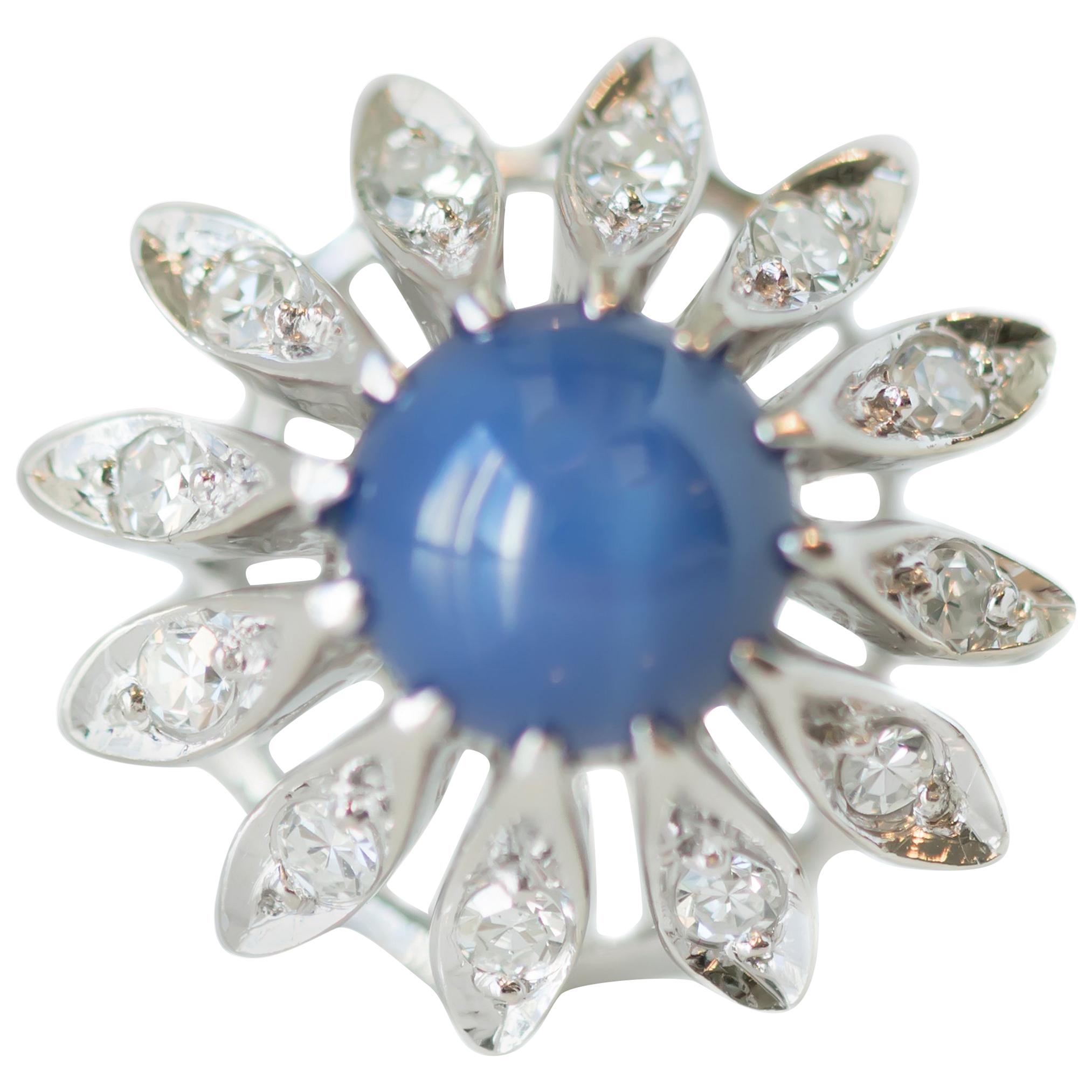 1950s 1 Carat Blue Star Sapphire, Diamond and 14 Karat White Gold Floral Ring For Sale