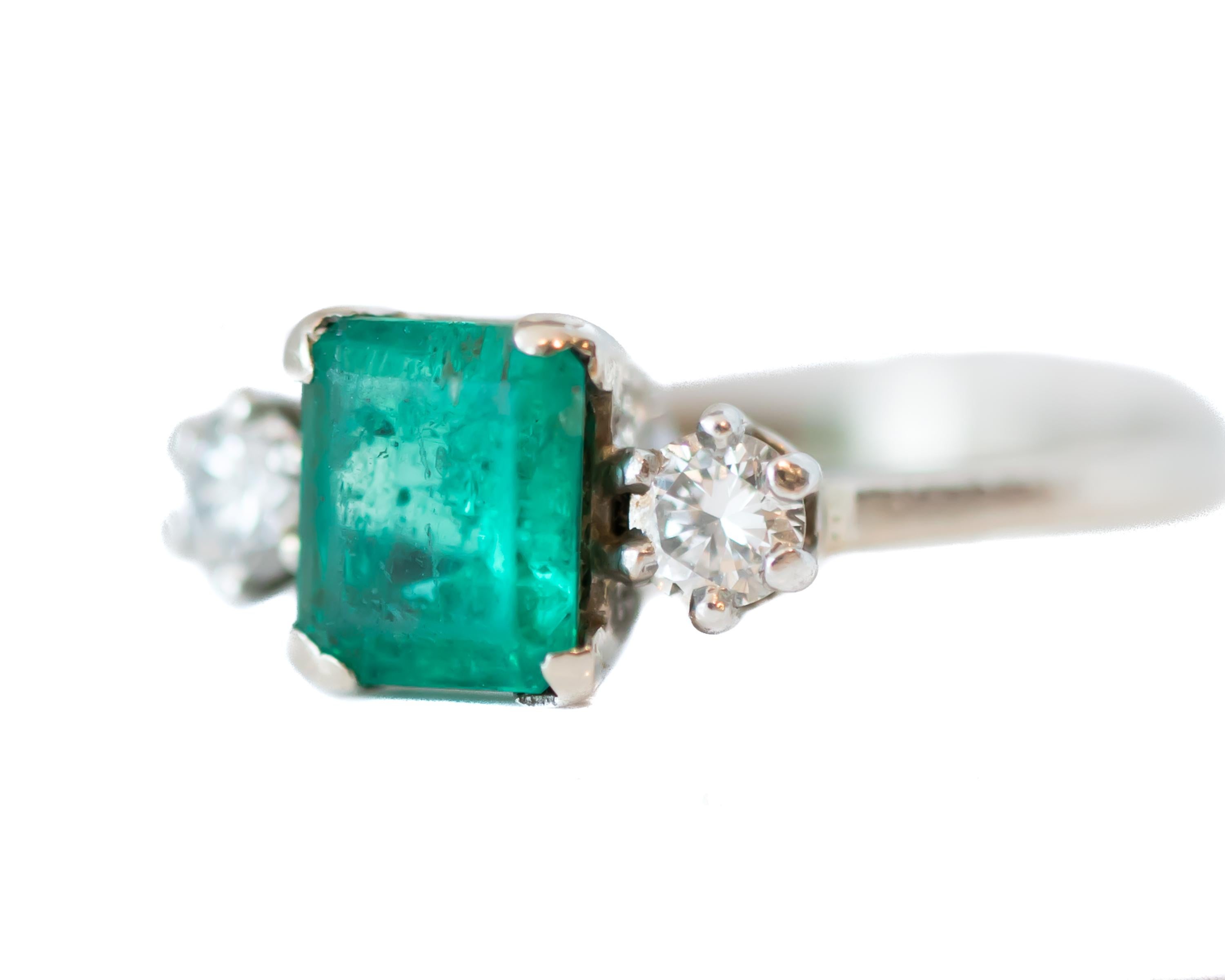 Retro 1950s 1 Carat Emerald and 0.20 Carat Diamond 14 Karat Gold Ring