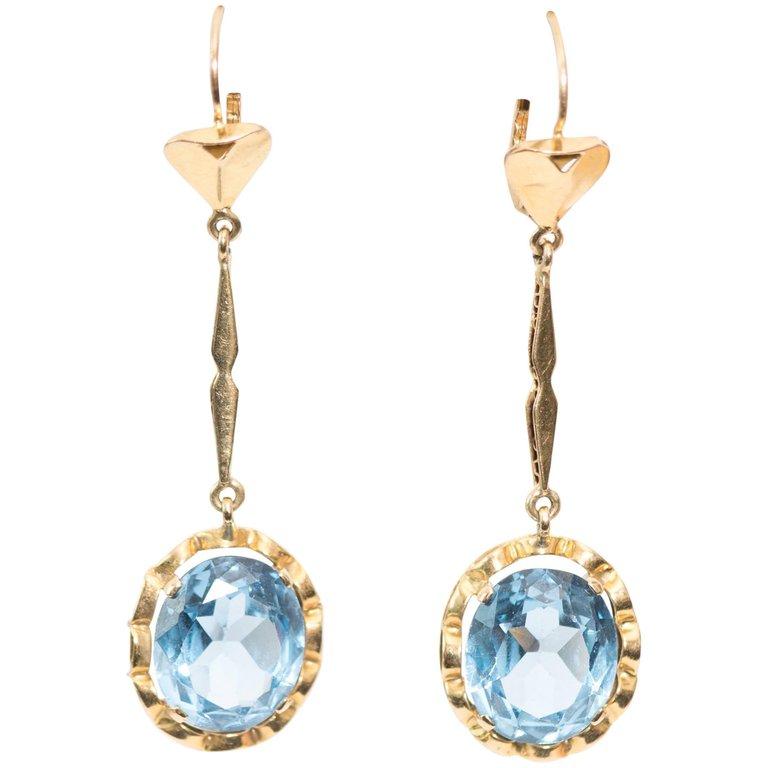 Oval Cut 1950s 10 carat total Blue Topaz and 14 Karat Yellow Gold Dangle Earrings