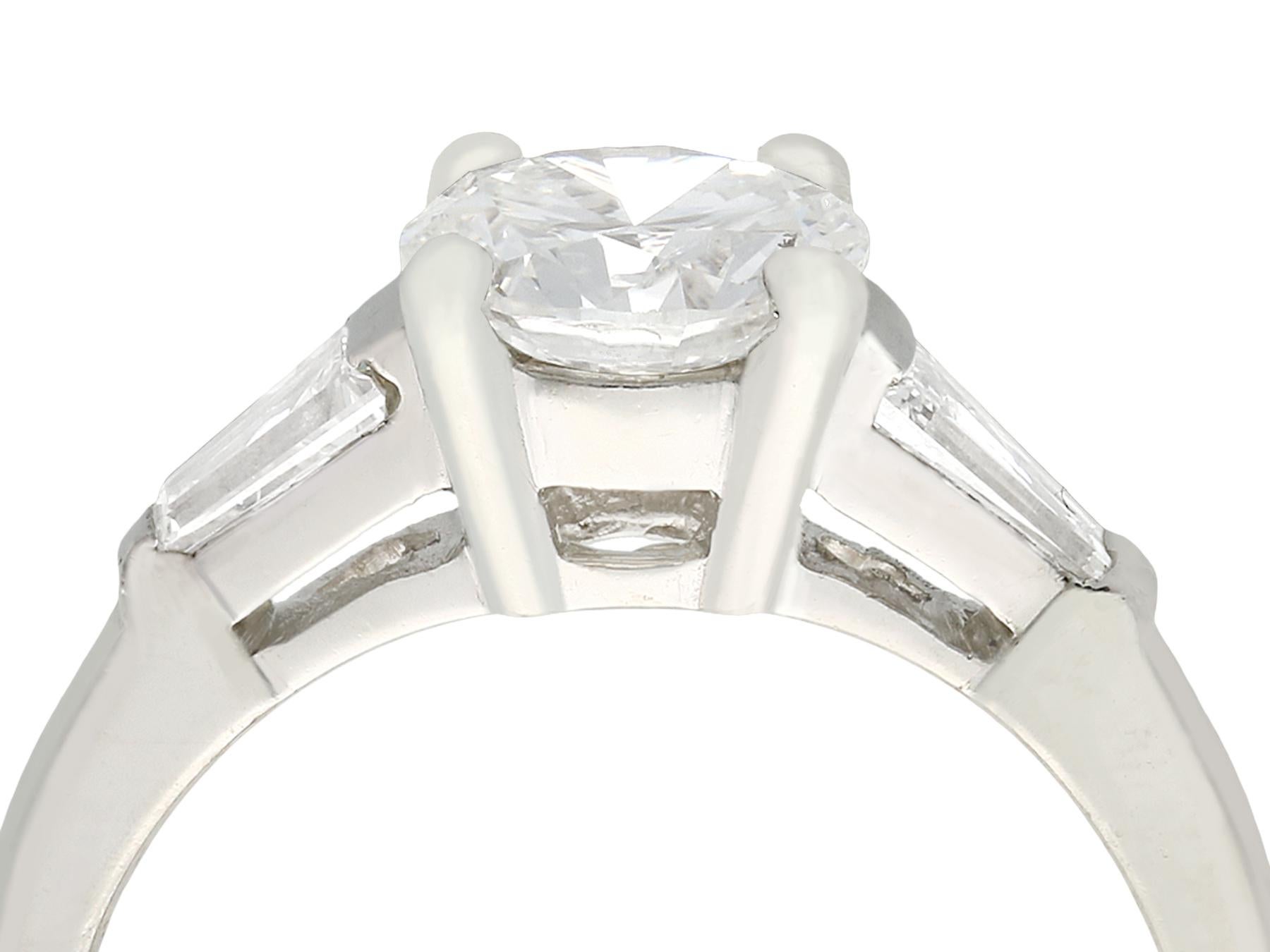 A fine and impressive 1.32Ct diamond (total) and platinum solitaire ring; part of our diverse jewelry and estate jewelry collections.

This fine and impressive vintage solitaire ring has been crafted in platinum.

The pierced decorated mount is