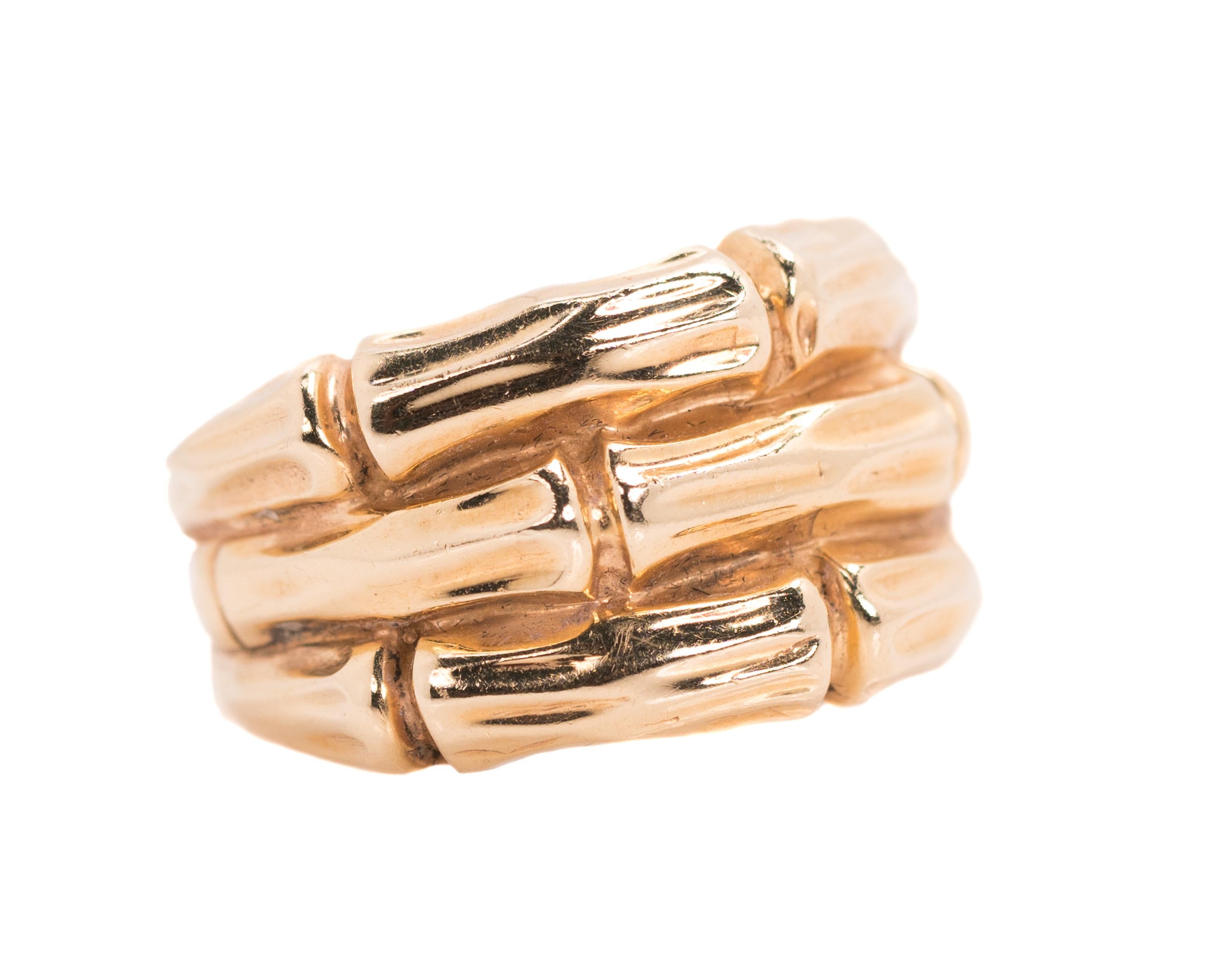 1950s Retro Bamboo Ring - 14 Karat Yellow Gold

Features:
3 horizontal levels of Bamboo textured bands
Center back of ring is smooth
Ring width tapers from 13.5 - 5 millimeters

Ring Details:
Size: 8.5, can be resized
Metal: 14 Karat Yellow