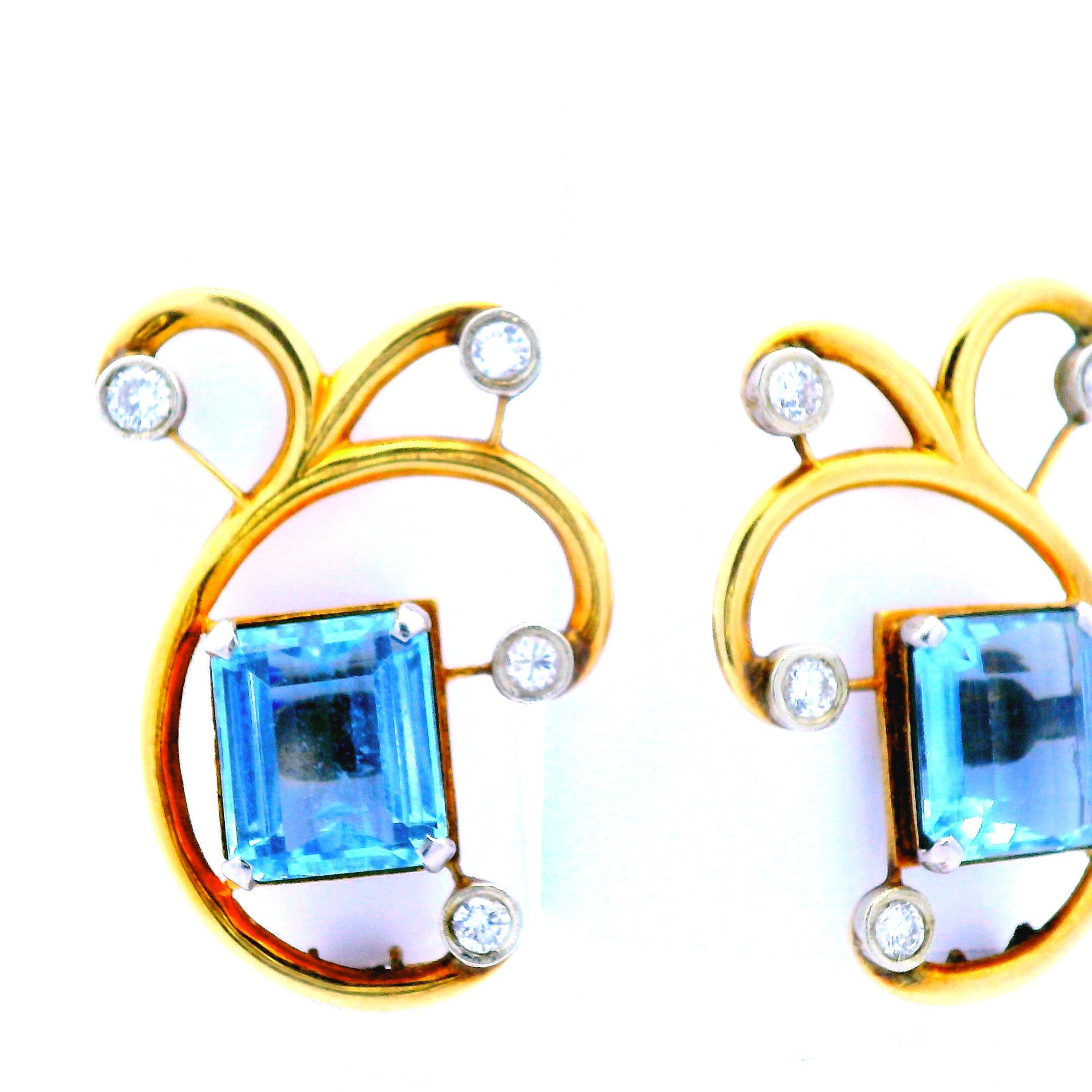 These beautiful earrings from the 1950s are made from 14k rose gold with aquamarine and diamond. The unique design of these earrings allow for them to be worn on either ear, allowing for more style options while wearing. They also feature a clip on