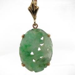 1950s 14 Karat Yellow Gold Carved Jadeite Drop Earrings