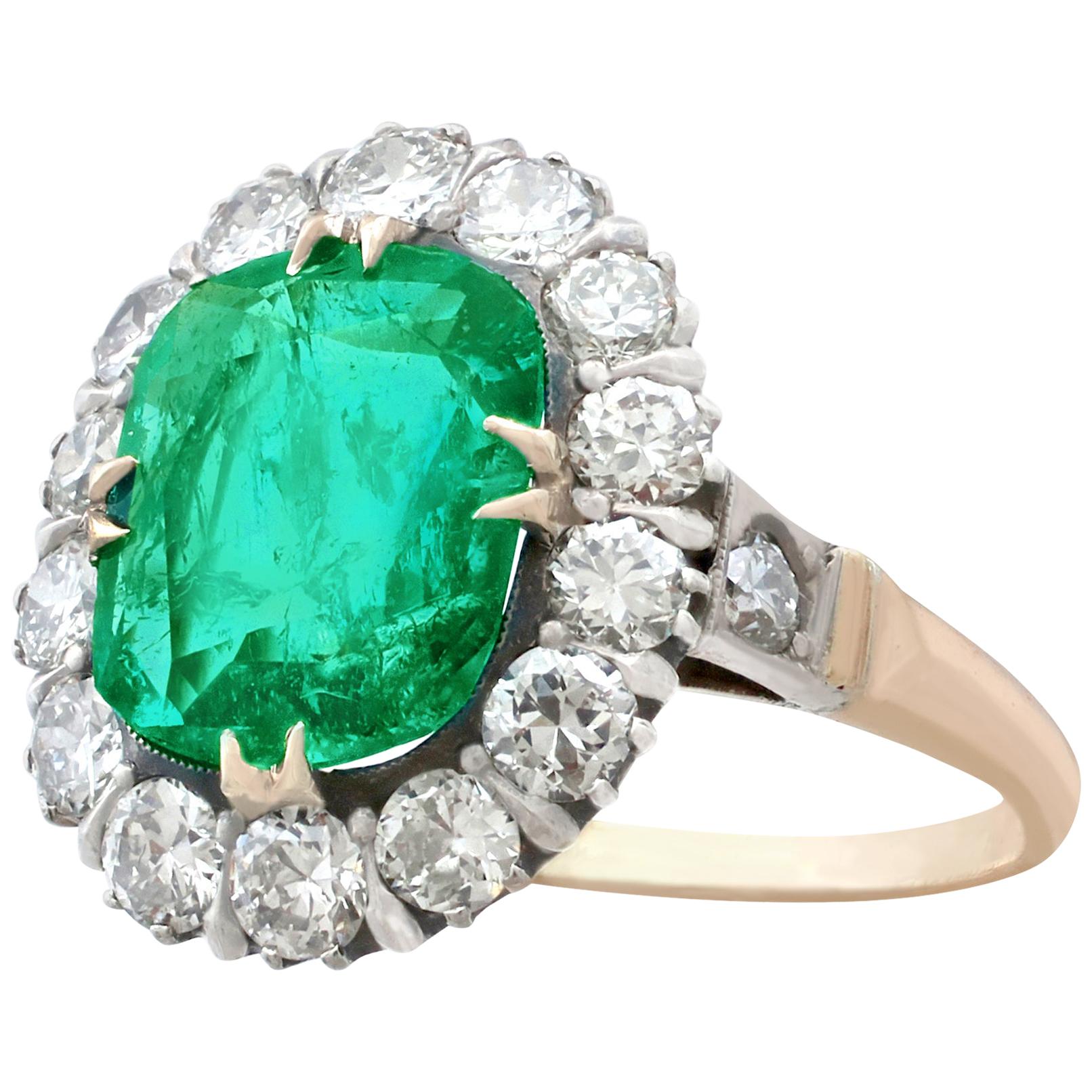 1950s 1.74 Carat Oval Cut Emerald and Diamond Yellow Gold Cluster Ring In Excellent Condition In Jesmond, Newcastle Upon Tyne