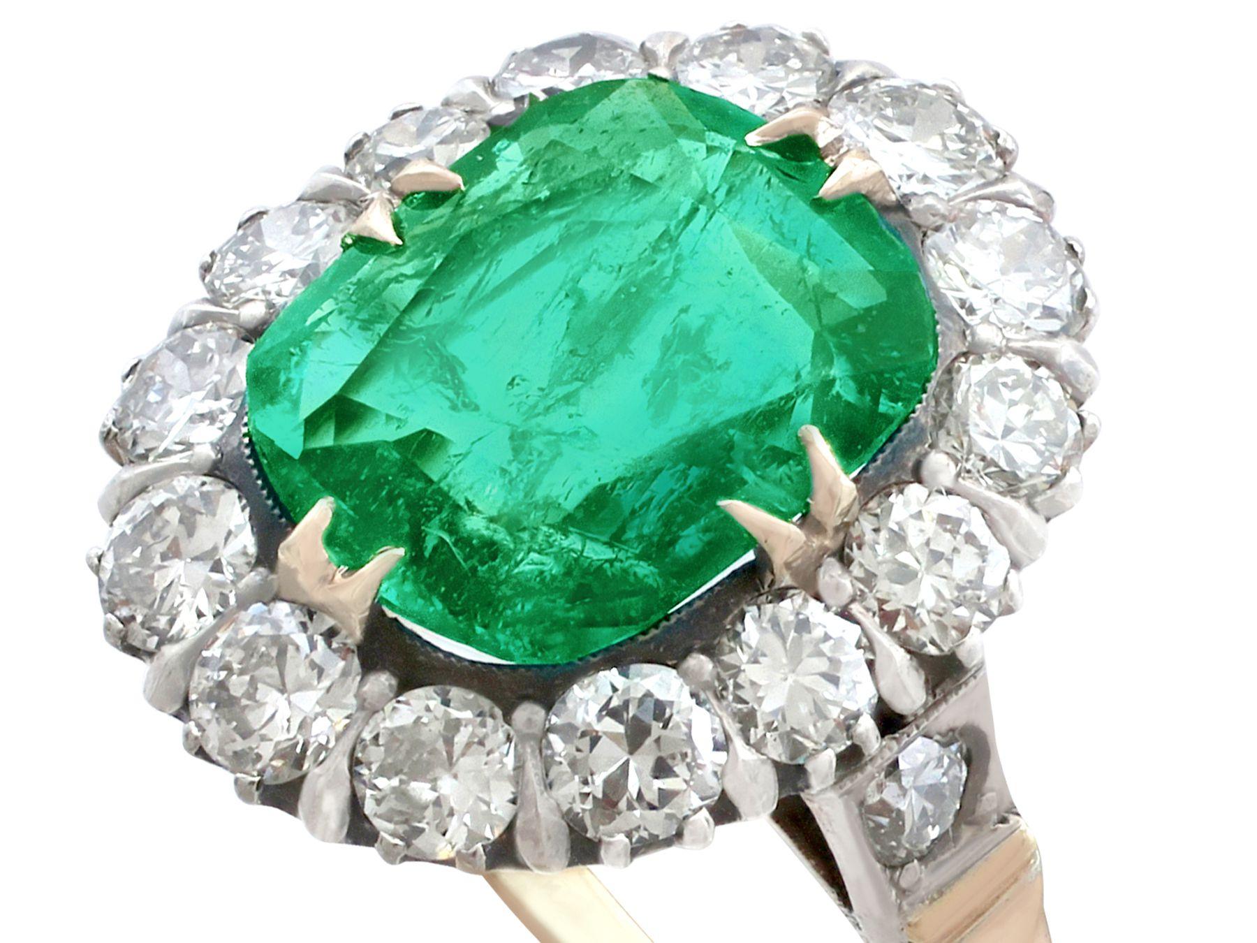 1950s 1.74 Carat Oval Cut Emerald and Diamond Yellow Gold Cluster Ring 1