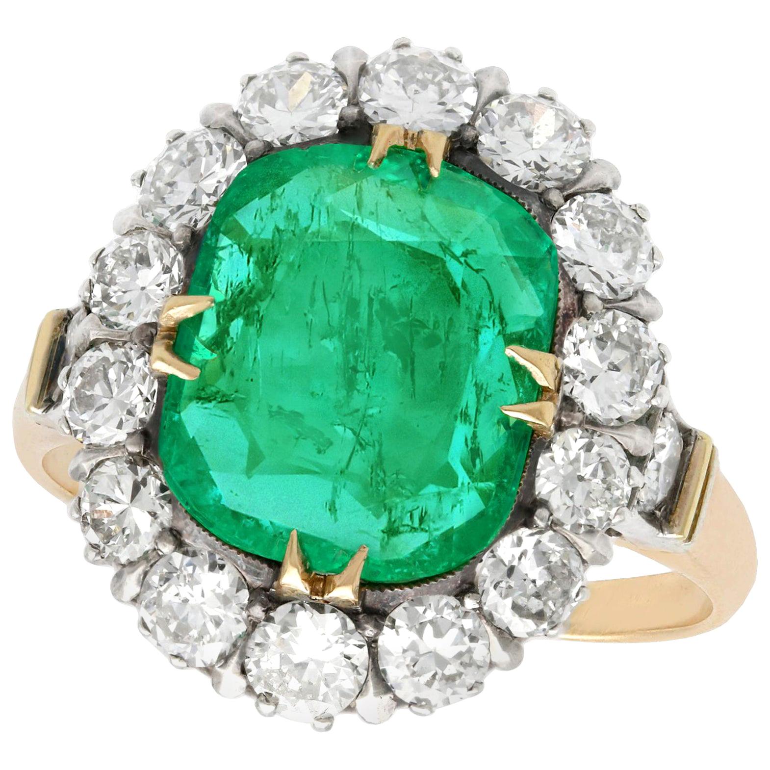 1950s 1.74 Carat Oval Cut Emerald and Diamond Yellow Gold Cluster Ring