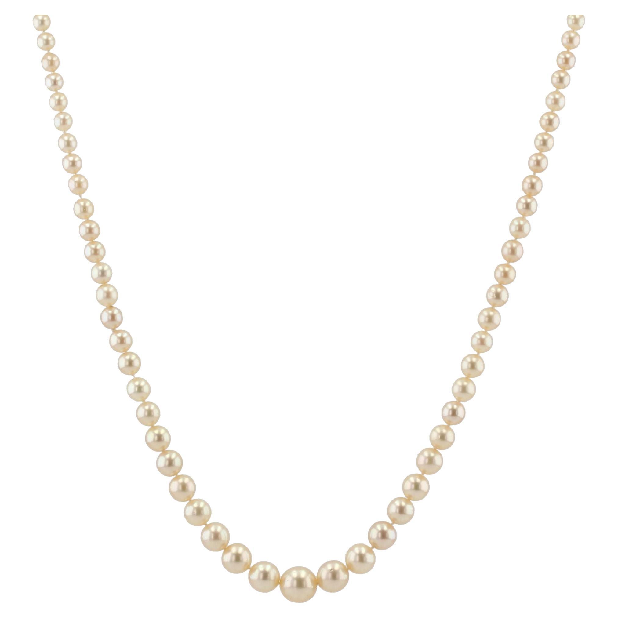 1950s 18 Karat White Gold Diamonds Clasp Falling Pearl Necklace For Sale