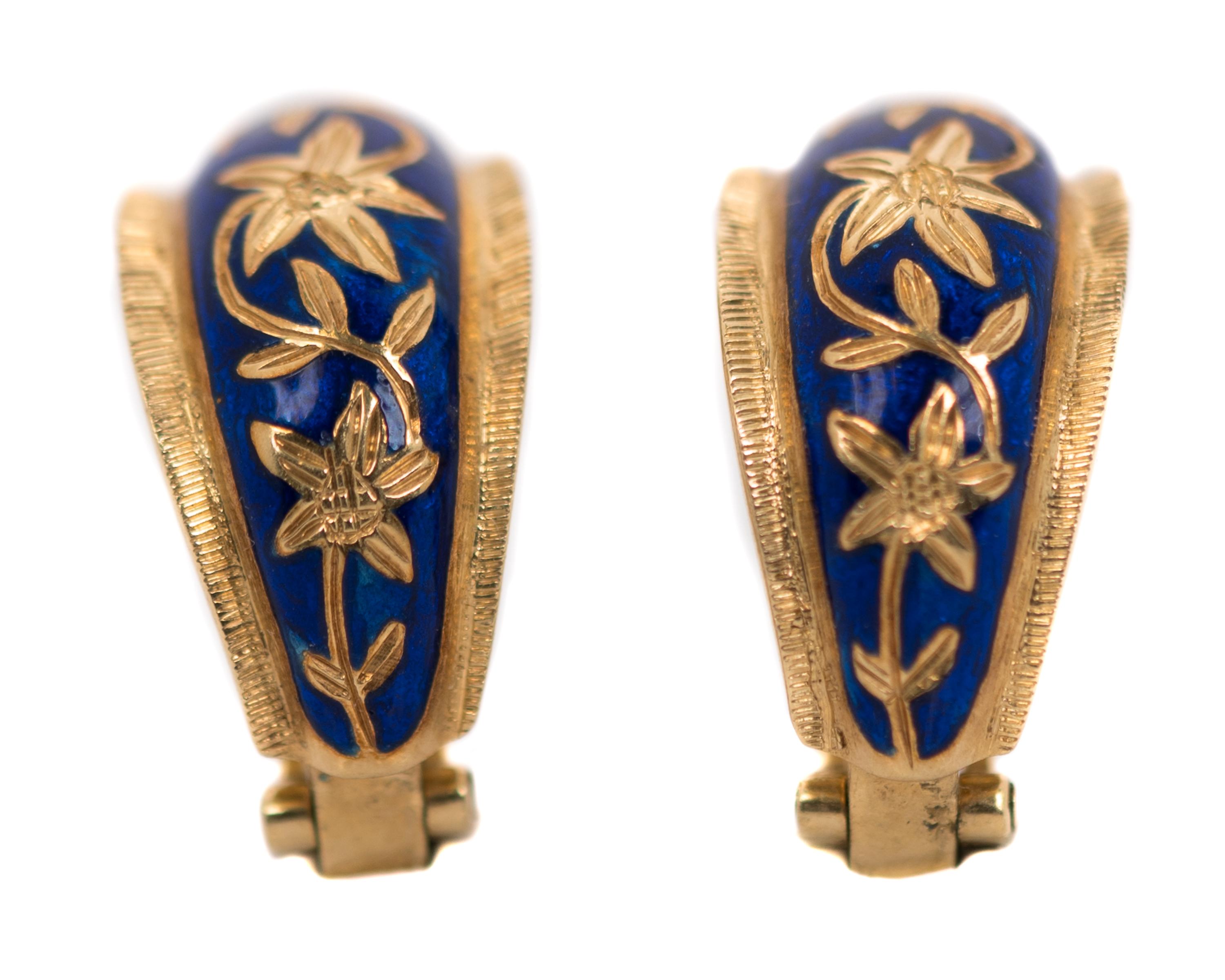 1950s Retro Floral Huggie Hoop Earrings - 18 Karat Yellow Gold, White Gold, Enamel

Feature: 
18 Karat Yellow Gold with White Gold hinges
Cobalt Blue Enamel
18 Karat Gold Floral Design
Hinged Lever Omega Backs with gentle grip texture
20 millimeters