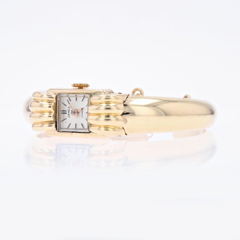 1950s 18 Karat Yellow Gold Lady's Bangle Wrist Watch For Sale at 1stDibs