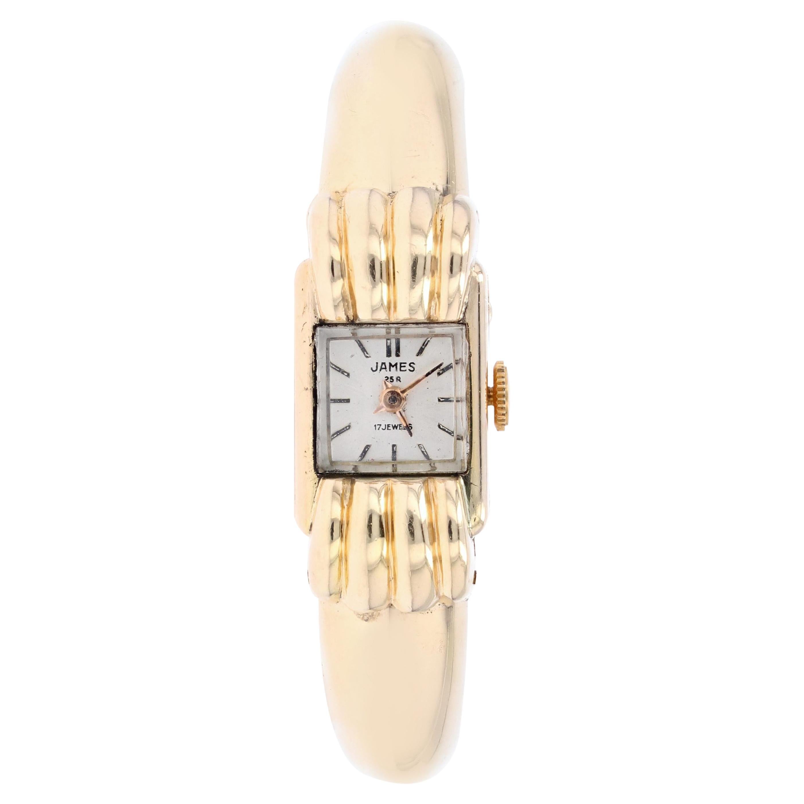 1950s 18 Karat Yellow Gold Lady's Bangle Wrist Watch For Sale