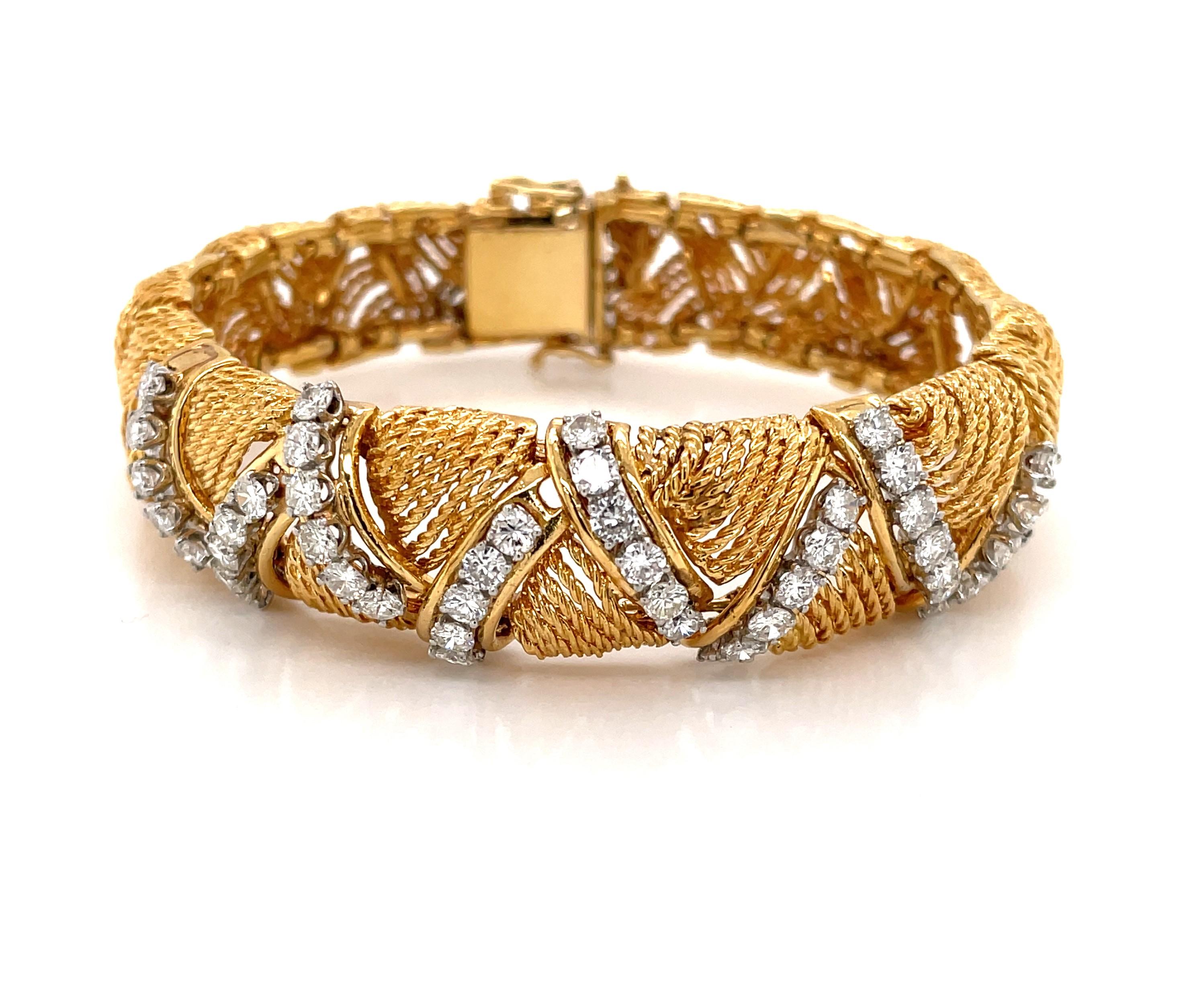 Glamorous and intricate 1950's woven 18K yellow gold rope bracelet with exciting diamond encrusted cross-lashing front detail feature. A fabulous period piece with lots of genuine sparkle that creates a truly electric look in woven eighteen karat