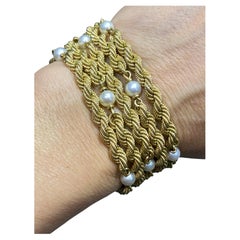 Pulsera de 5 vueltas de oro de 18 quilates de los años 50 con perlas de Carlo Weingrill
