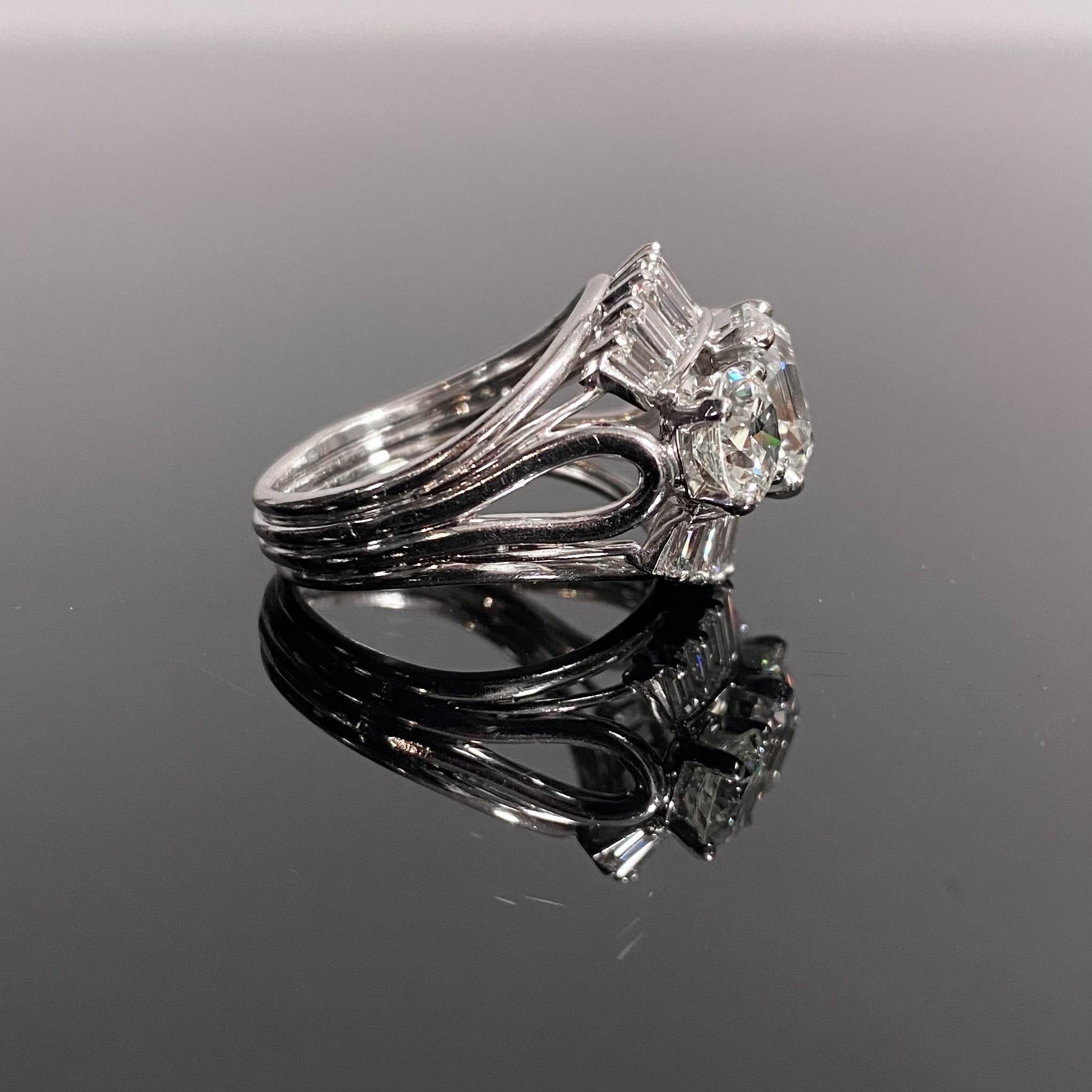 1950s-1960s 7 Carat Three-Stone Emerald Round Diamond Ballerina Engagement Ring 1