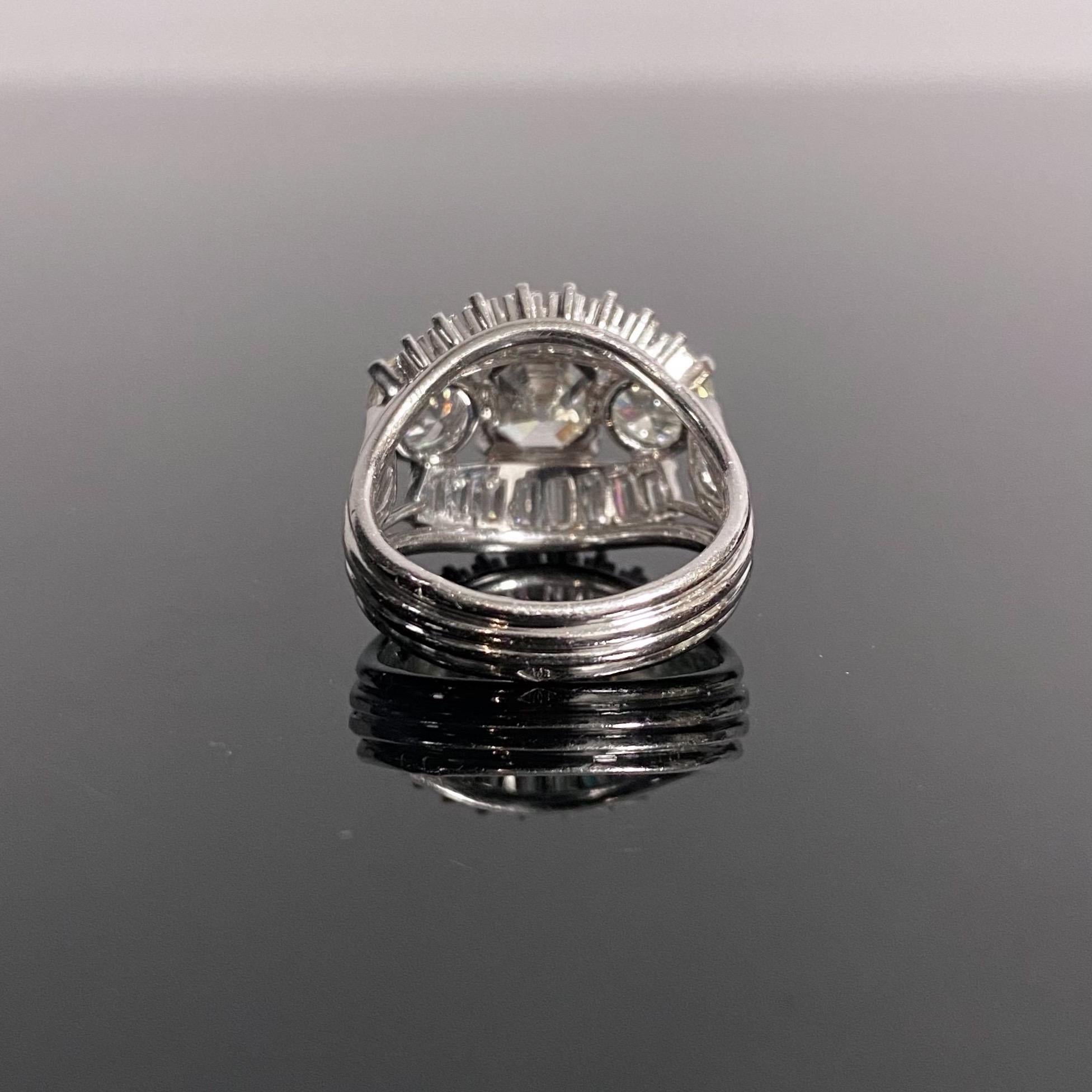 1950s-1960s 7 Carat Three-Stone Emerald Round Diamond Ballerina Engagement Ring 2