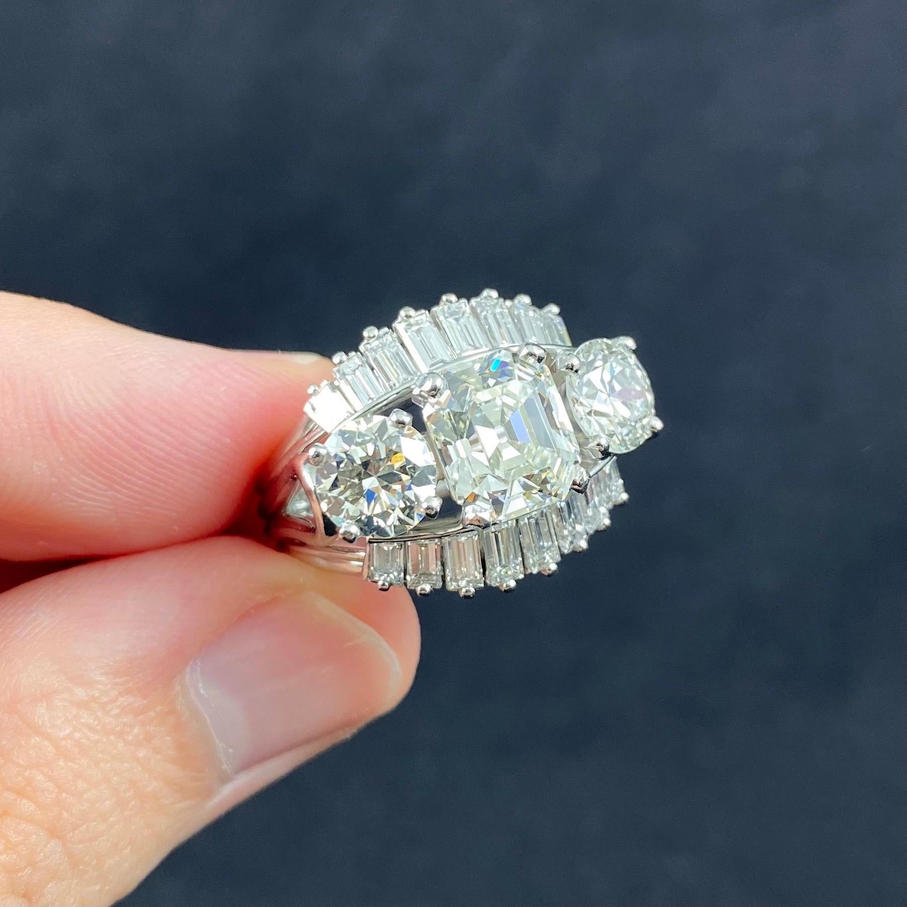 1950s-1960s 7 Carat Three-Stone Emerald Round Diamond Ballerina Engagement Ring 7