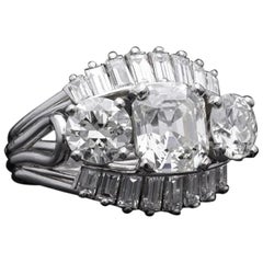 Vintage 1950s-1960s 7 Carat Three-Stone Emerald Round Diamond Ballerina Engagement Ring