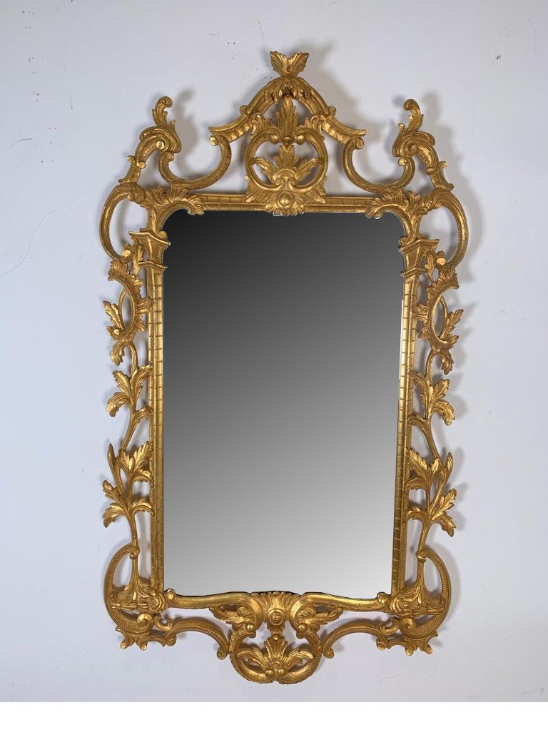 1950s-1960s Italian gold giltwood Rococo style mirror
Nicely made and in very good condition with age appropriate wear
Dimensions: 27