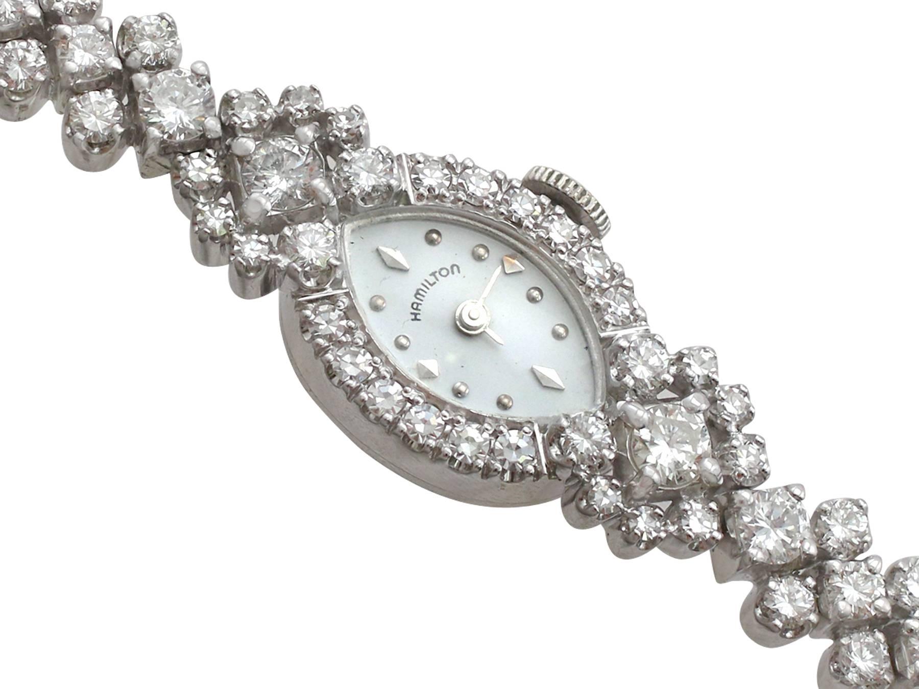 A stunning vintage 1950's 2.06 carat diamond and 14 karat white gold ladies cocktail watch; part of our diverse antique jewellery collections.

This stunning, fine and impressive diamond cocktail watch has been crafted in 14k white gold.

The