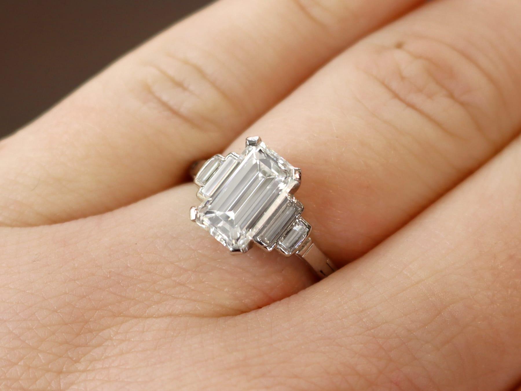 1.5 carat emerald cut diamond ring