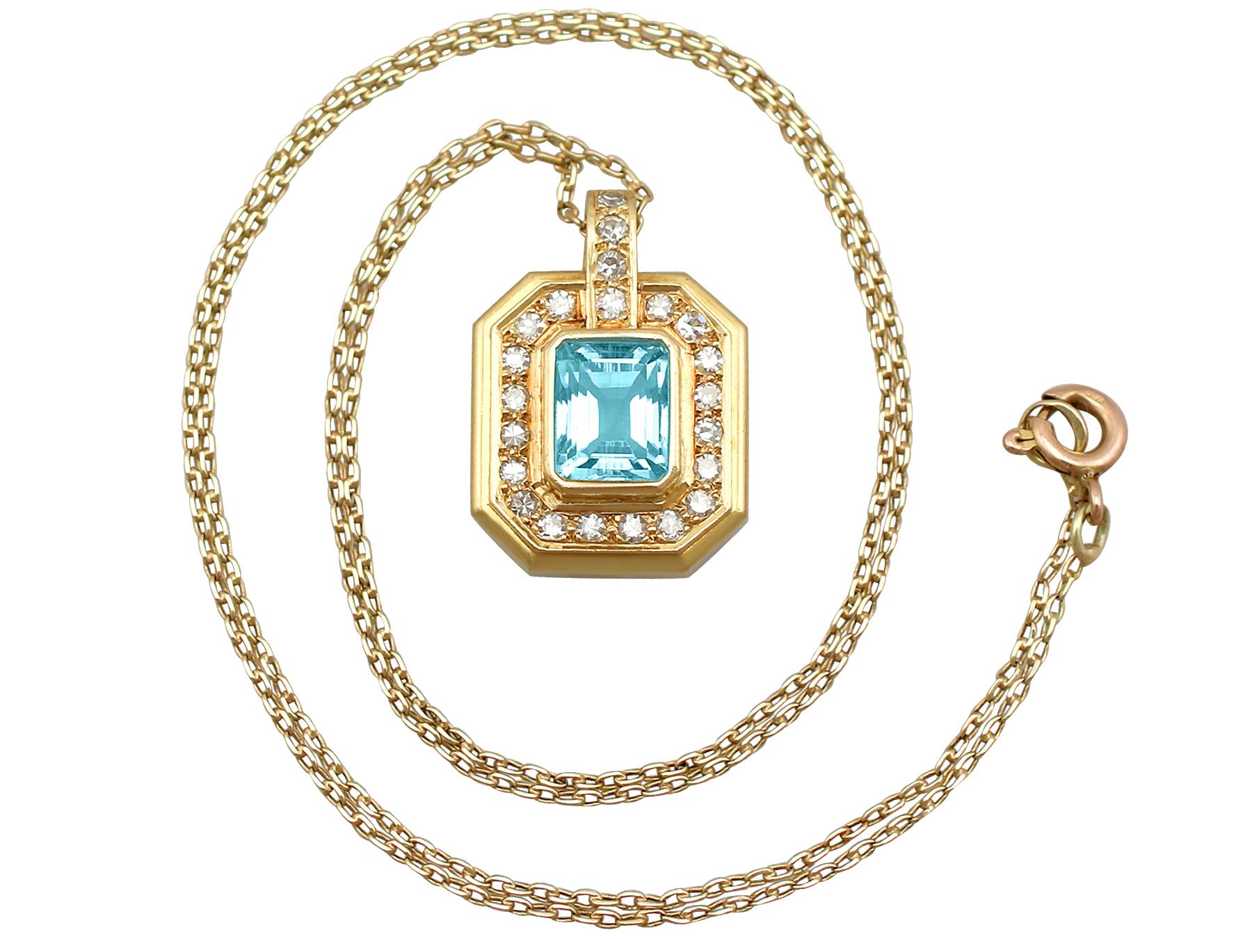 A fine and impressive vintage Belgian 2.49 carat natural aquamarine and 0.80 carat diamond, 18 karat yellow gold pendant; part of our diverse vintage jewelry and estate jewelry collections.

This fine and impressive aquamarine and diamond pendant