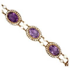 1950s 25 Carat Amethyst and Pearl Halo Link Bracelet en or 14 carats