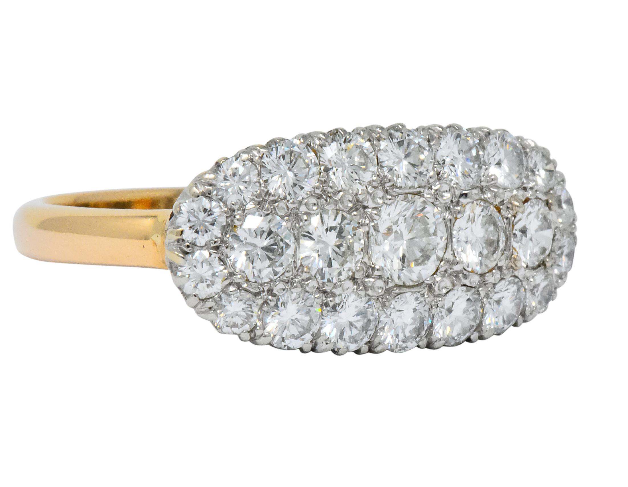 Centering a cluster of round brilliant cut diamonds

Total diamond weight approximately 2.80 carats, G-H color and VS to SI clarity

Bead set in white gold with a yellow gold shank

Stamped 14K

Ring Size: 11 1/2 & Sizable

Top measures 11.6 mm and