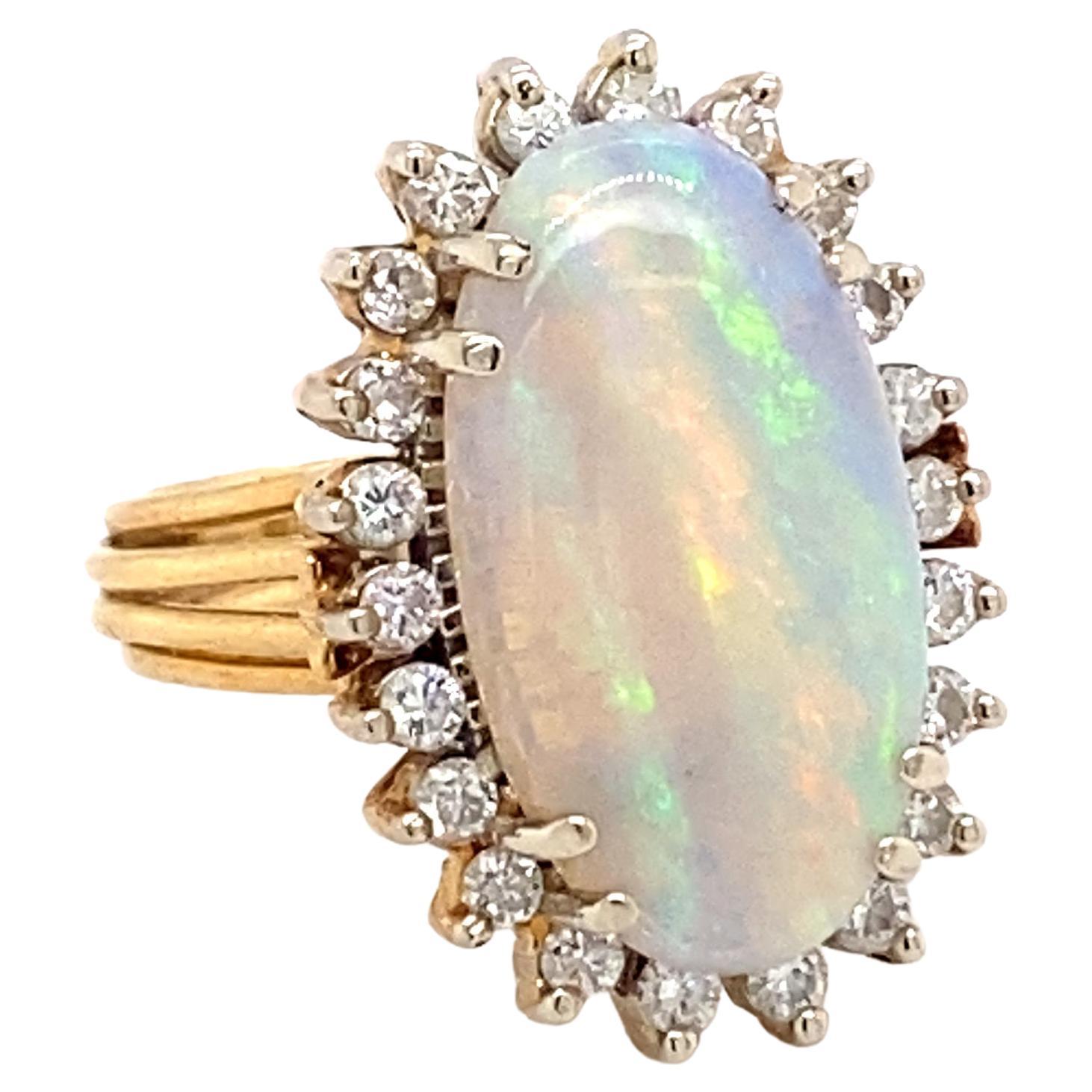 1950s 3 Carat Opal and 0.50 Carat Diamond Halo Ring in 18 Karat Gold For Sale